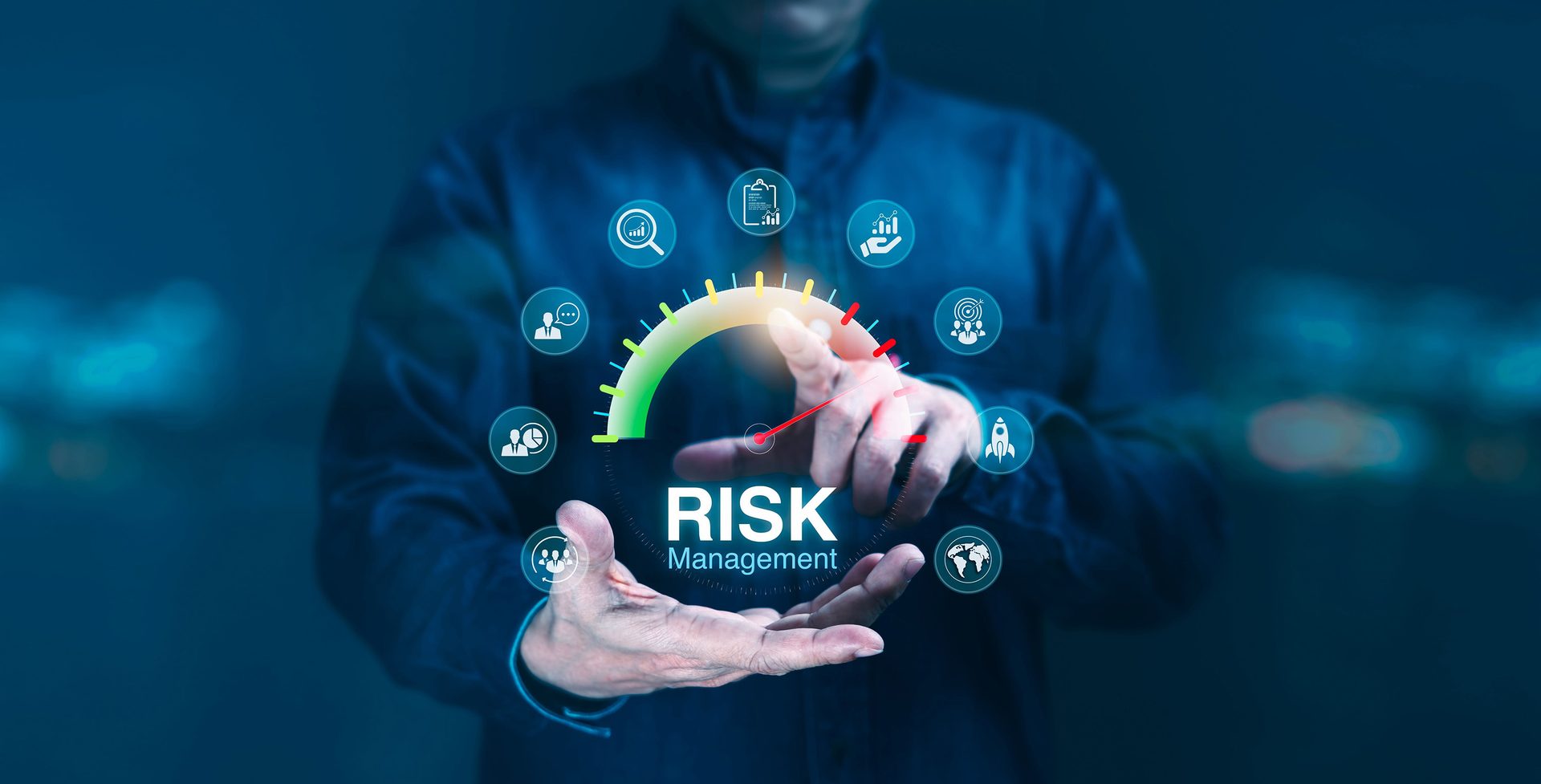 Hands interact with a digital risk management gauge surrounded by business-related icons.