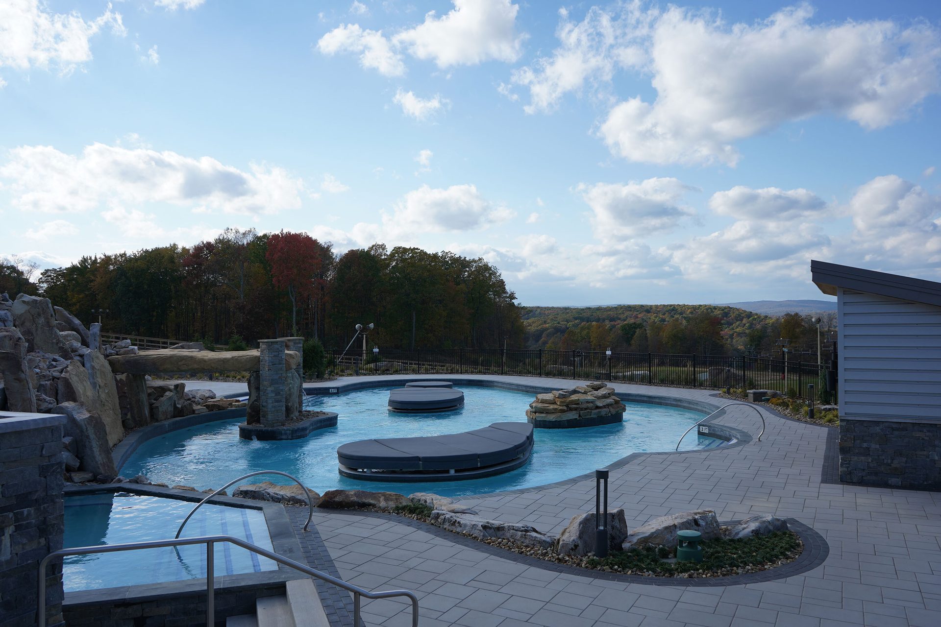 Body of water, Swimming pool, Urban design, Sky, Cloud, Tree