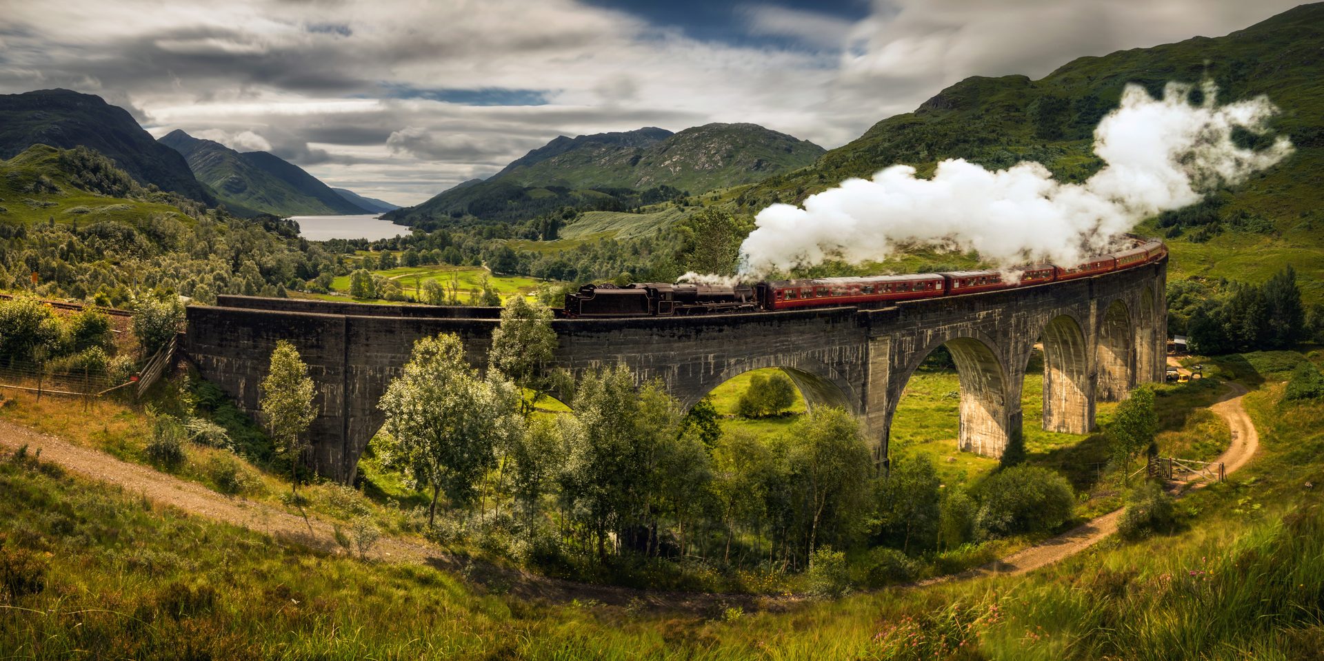 Rolling stock, Sky, Cloud, Plant, Train, Mountain, Nature, Highland, Track, Railway