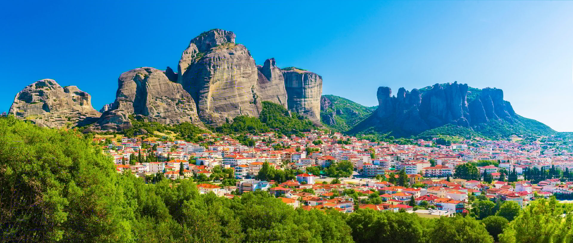 Natural landscape, Sky, Mountain, Building, Nature, Highland, Plant, Vegetation, Biome, Travel