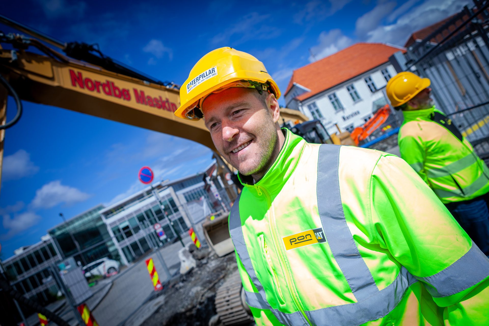 Hard hat, High-visibility clothing, Cloud, Smile, Workwear, Helmet, Sky, Building, Engineer, Headgear