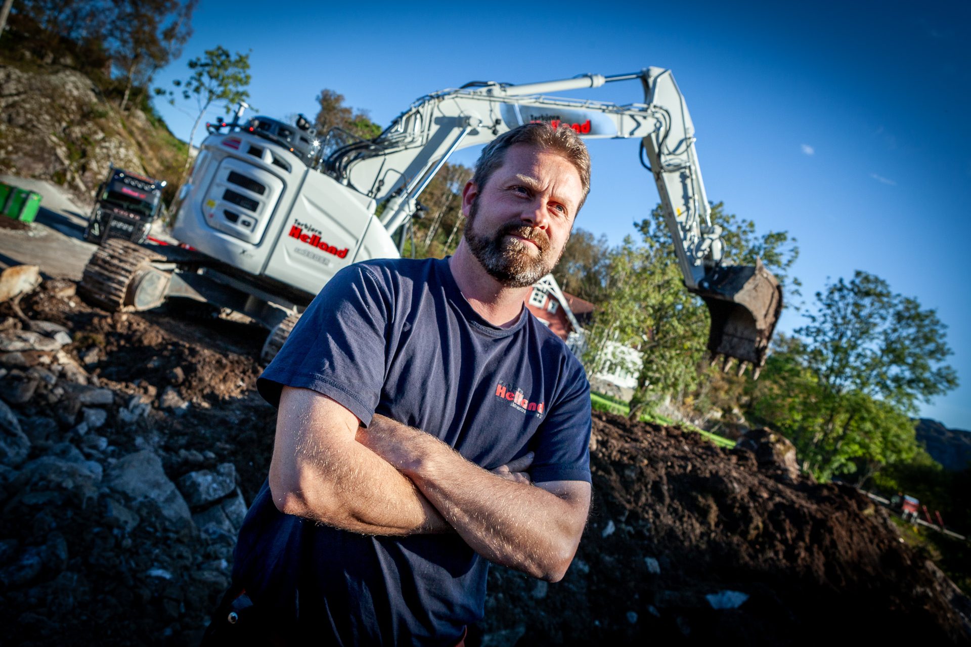 Automotive tire, Flash photography, Motor vehicle, Sky, Plant, Tree, Asphalt, Wood, Slope