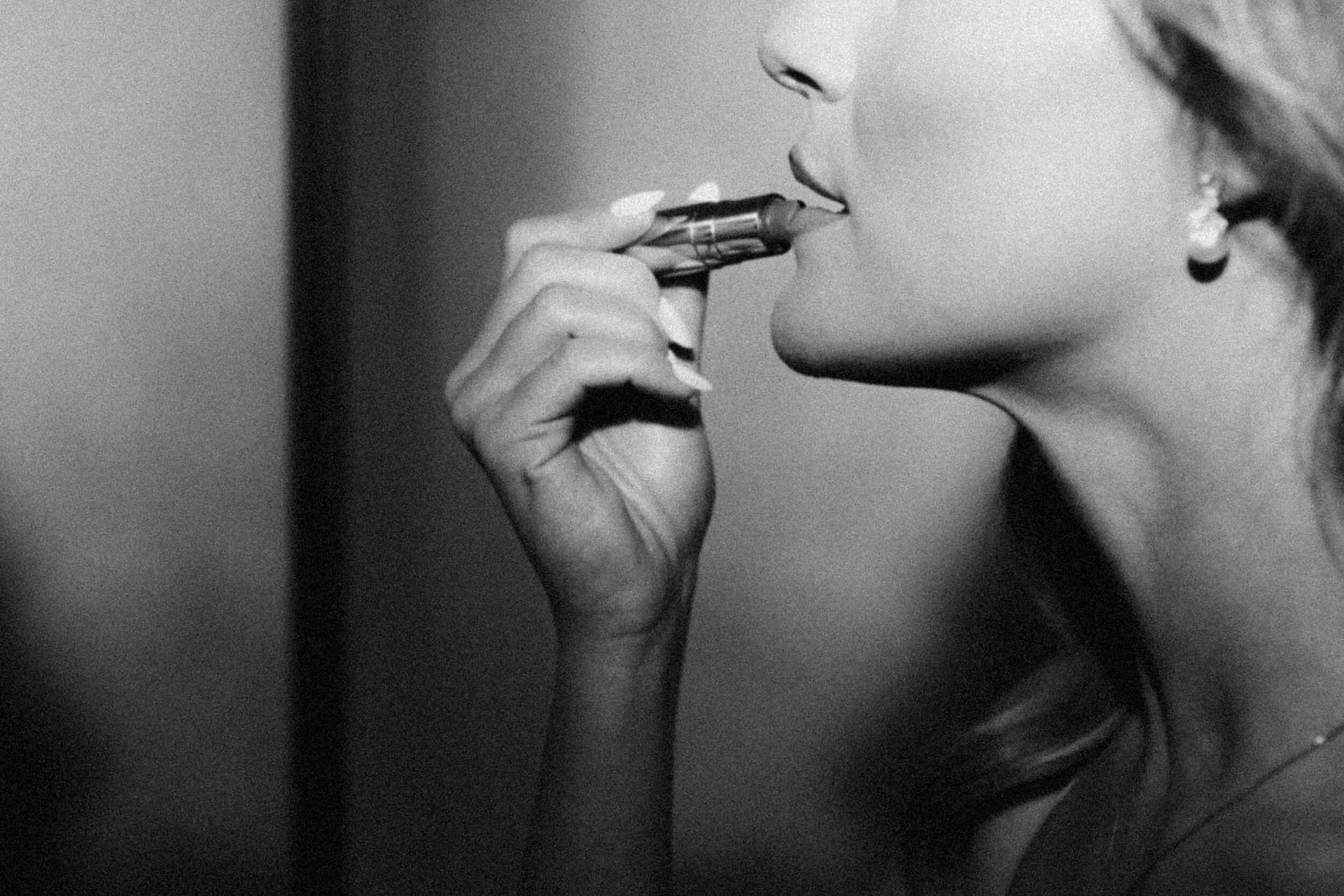 Monochrome photography, Facial expression, Tobacco products, Eyebrow, Lips, Eyelash, Jaw, Beauty, Finger, Smoking