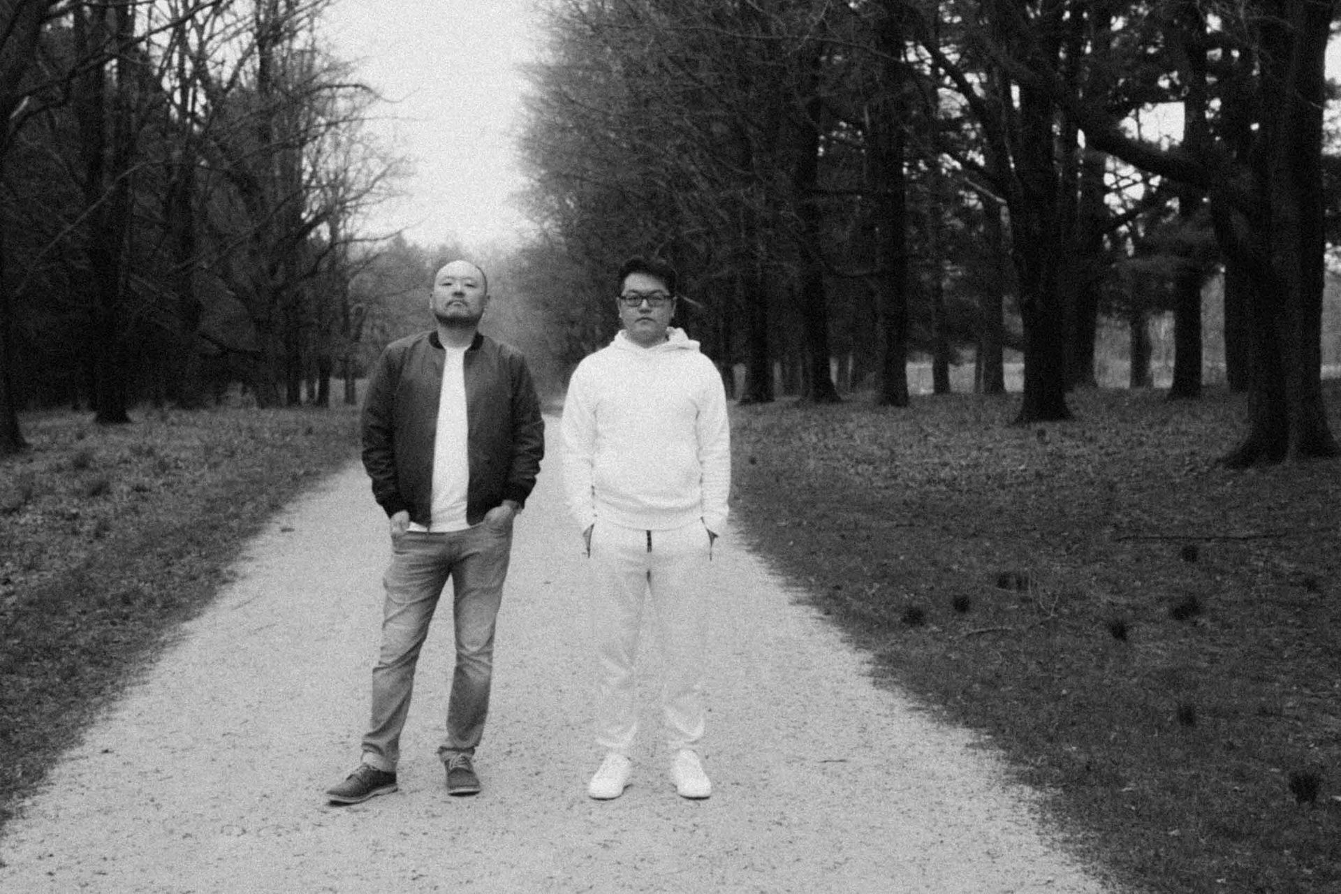 People in nature, Black and white, Monochrome photography, Photograph, Standing, Trousers, Jacket, Recreation