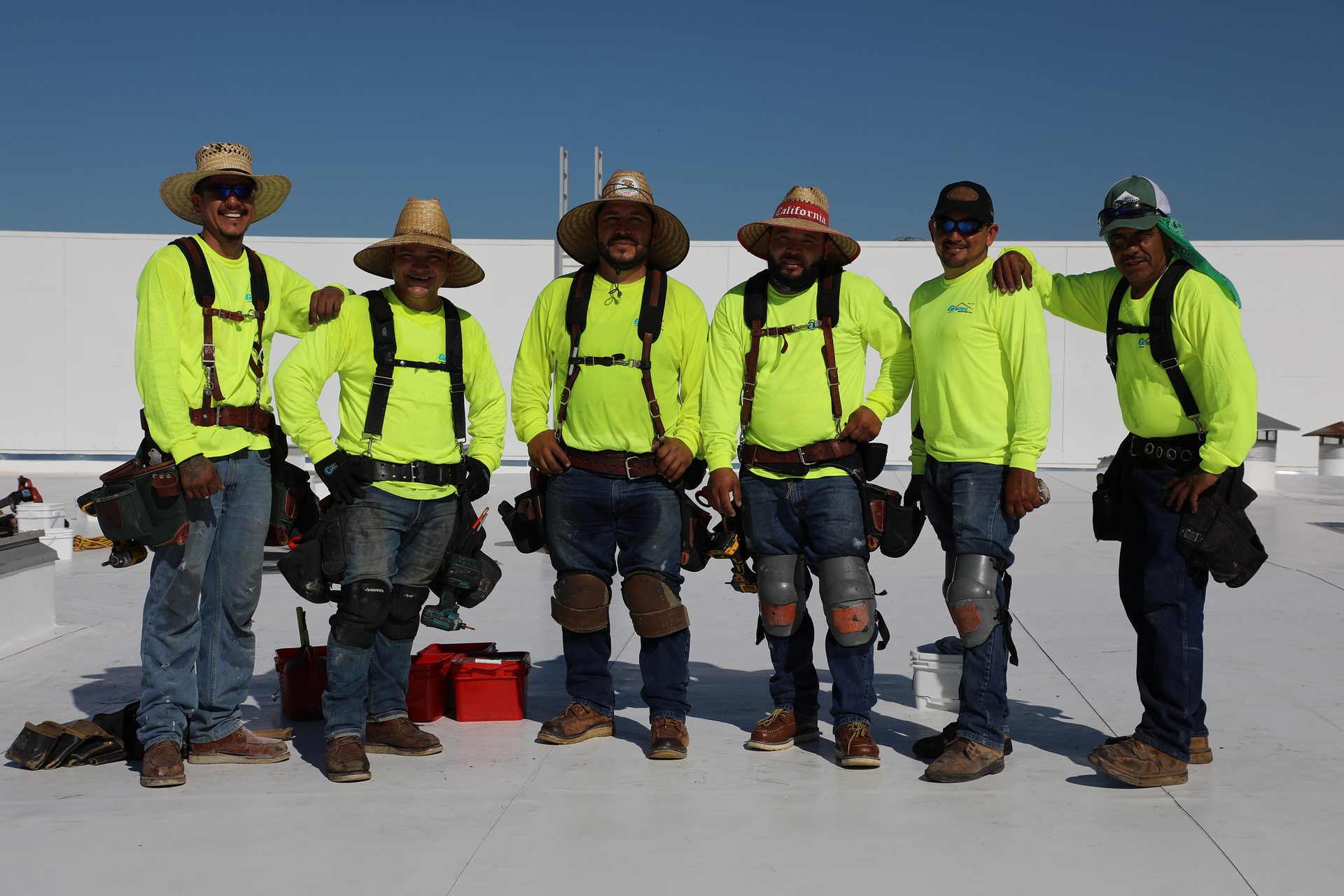 Hard hat, High-visibility clothing, Jeans, Workwear, Sky, Engineer, Travel, Headgear