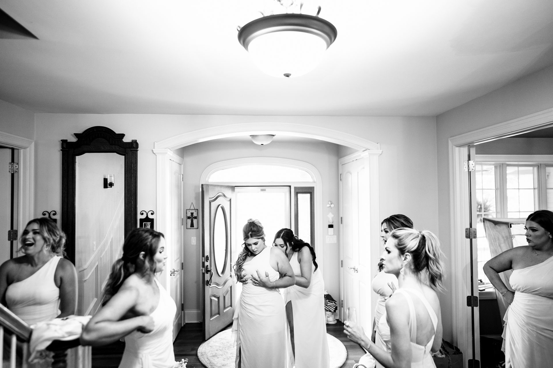 Bridal clothing, Flash photography, Interior design, Wedding dress, Arm, Black, Lighting, Happy, Black-and-white
