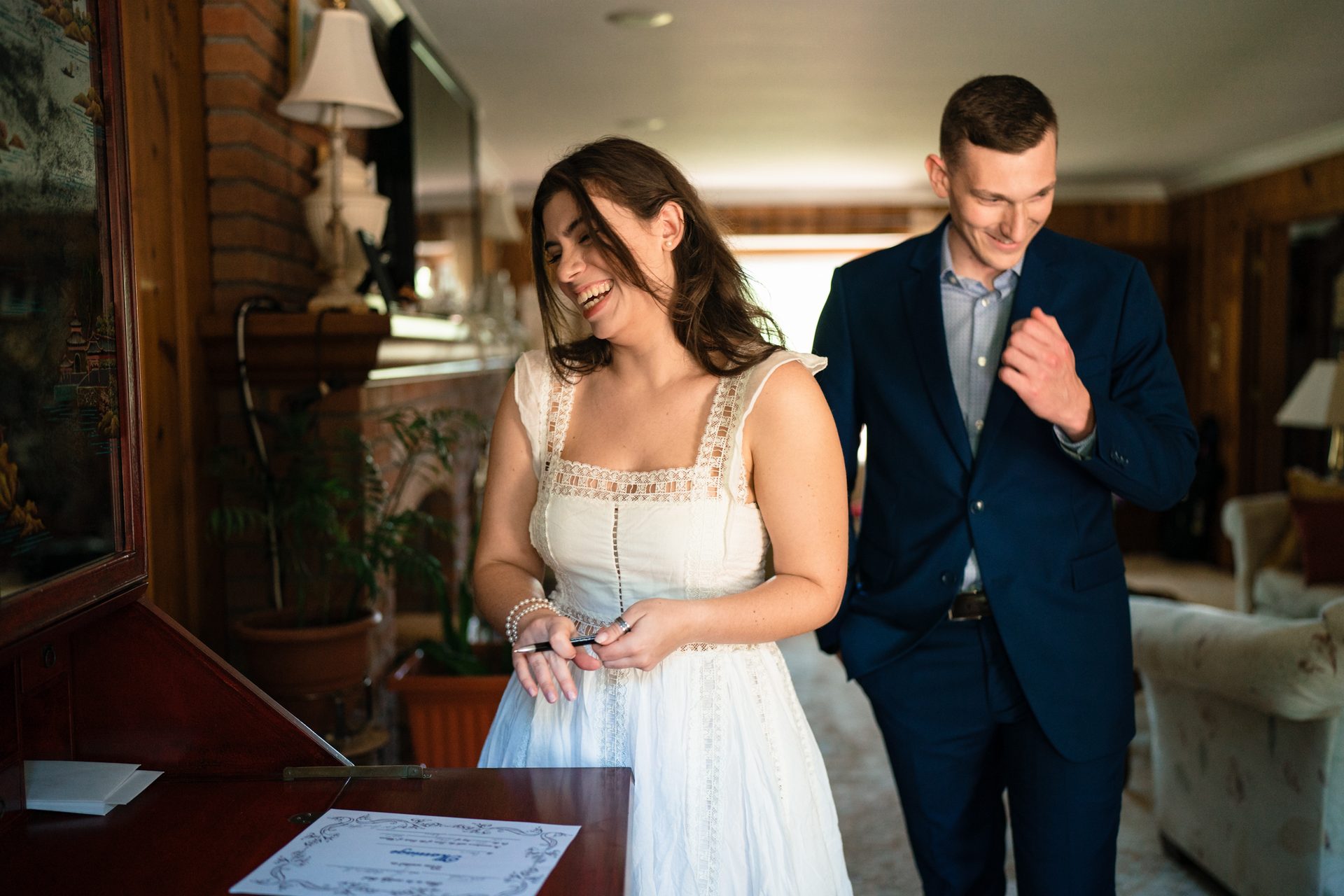 Flash photography, Bridal clothing, Wedding dress, Smile, Happy, Interaction, Tie