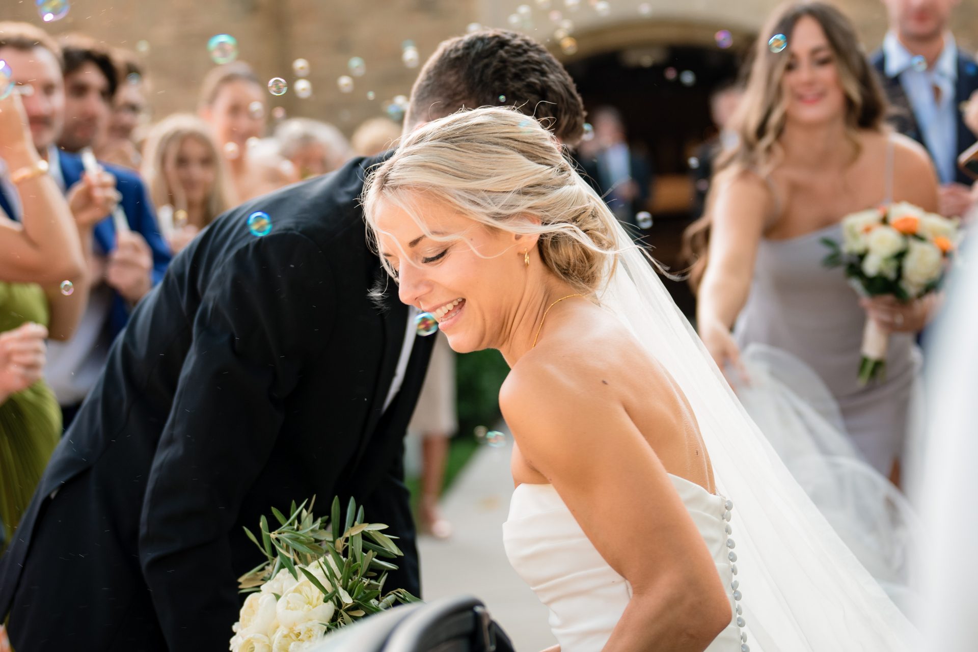 Wedding dress, Facial expression, Bridal veil, Flower, Smile, Bride, Photograph, Human, Plant