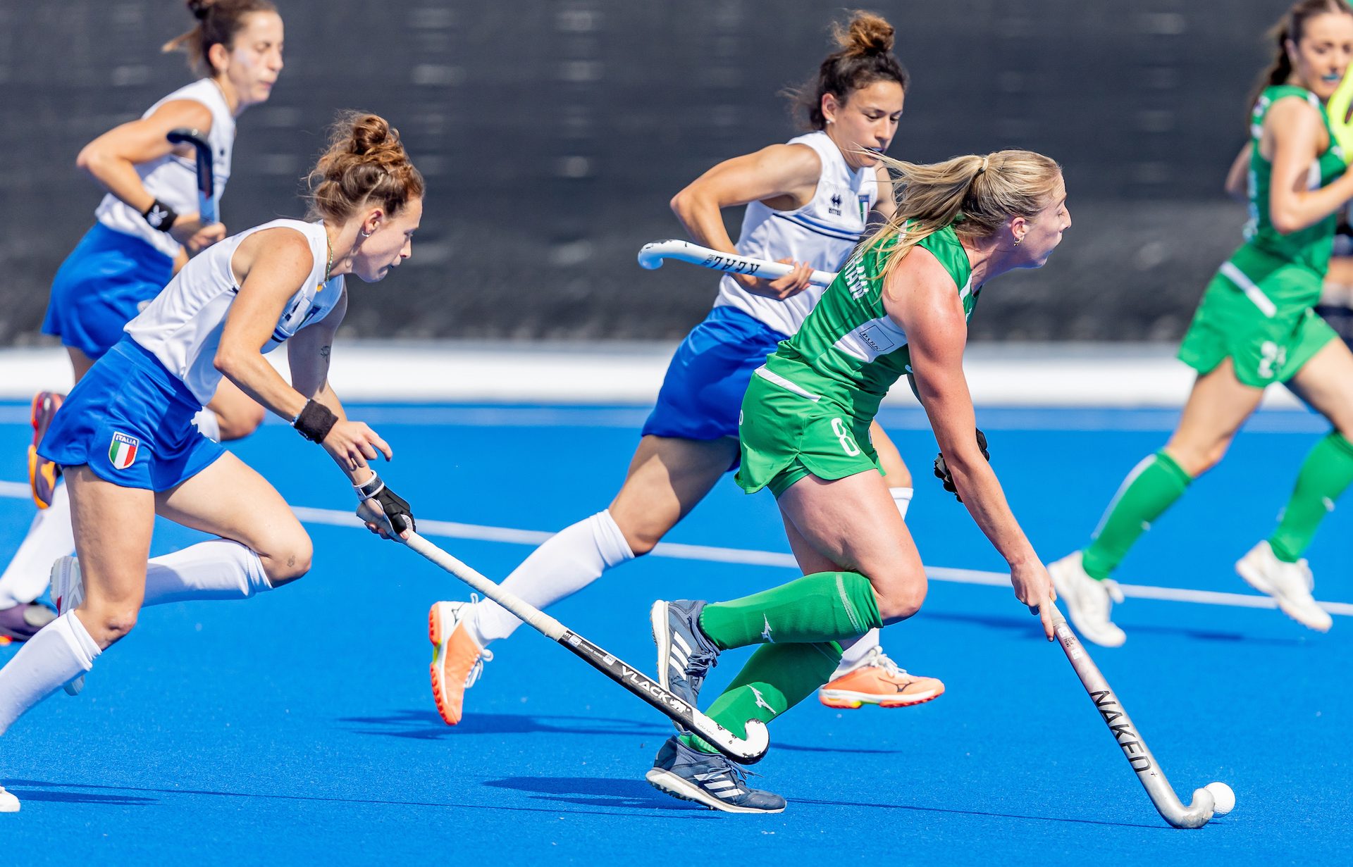 Sports equipment, Green, Muscle, Hockey, Black, Player, Mammal