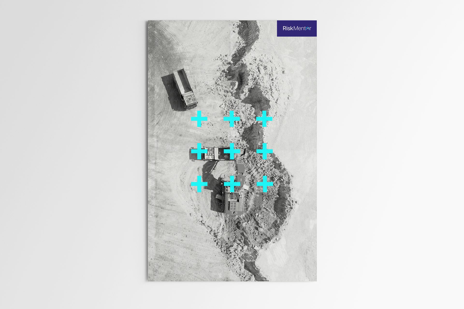 Aerial construction site with truck, excavator, turquoise plus signs, and RiskMentor logo.