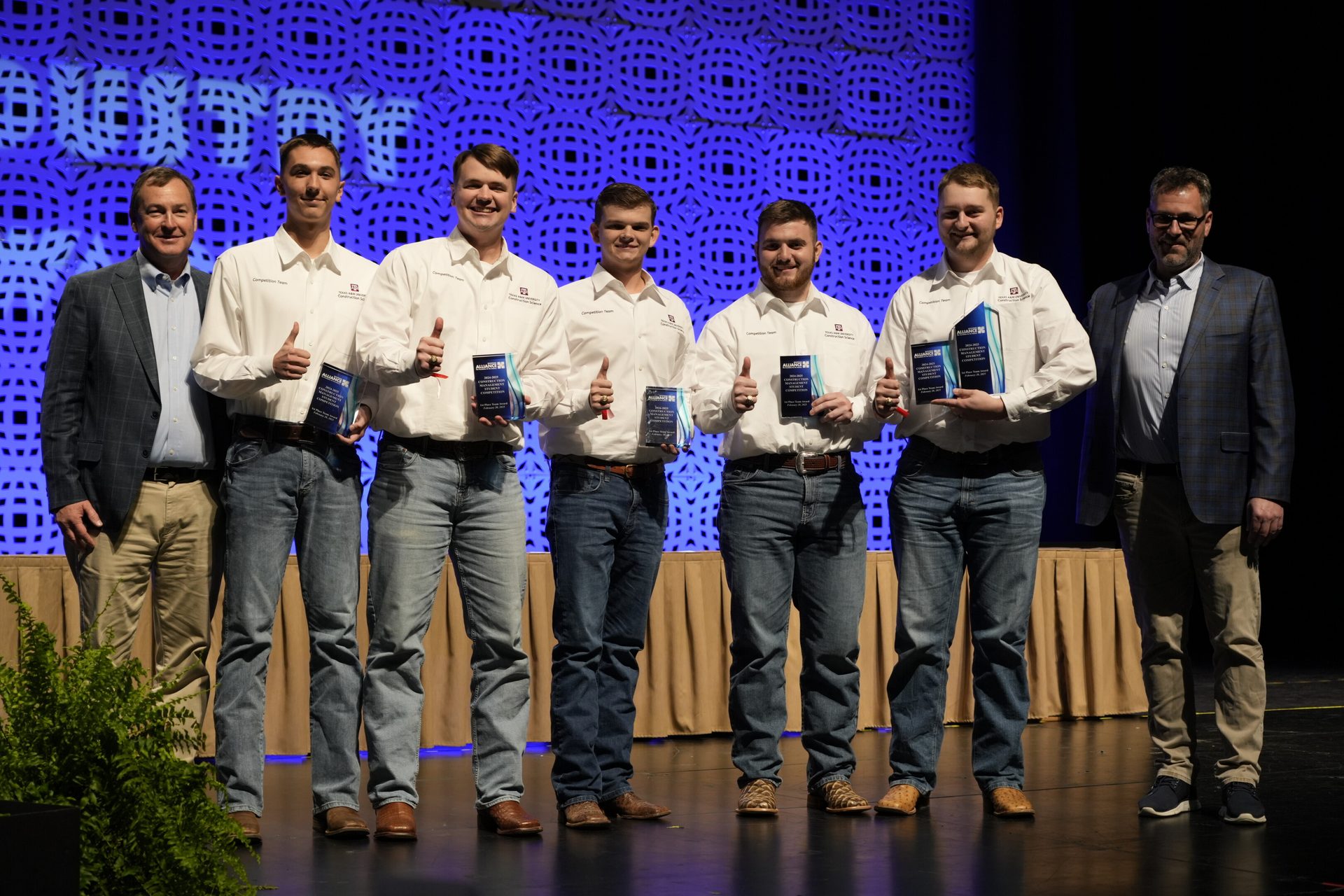 Social group, Dress shirt, Suit trousers, Jeans, Event, Standing, Team