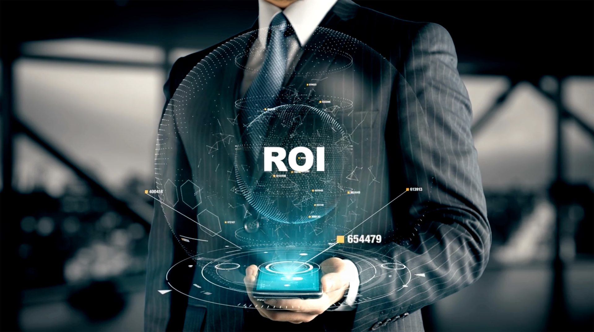 Man in suit holds phone with glowing ROI holographic display with data.