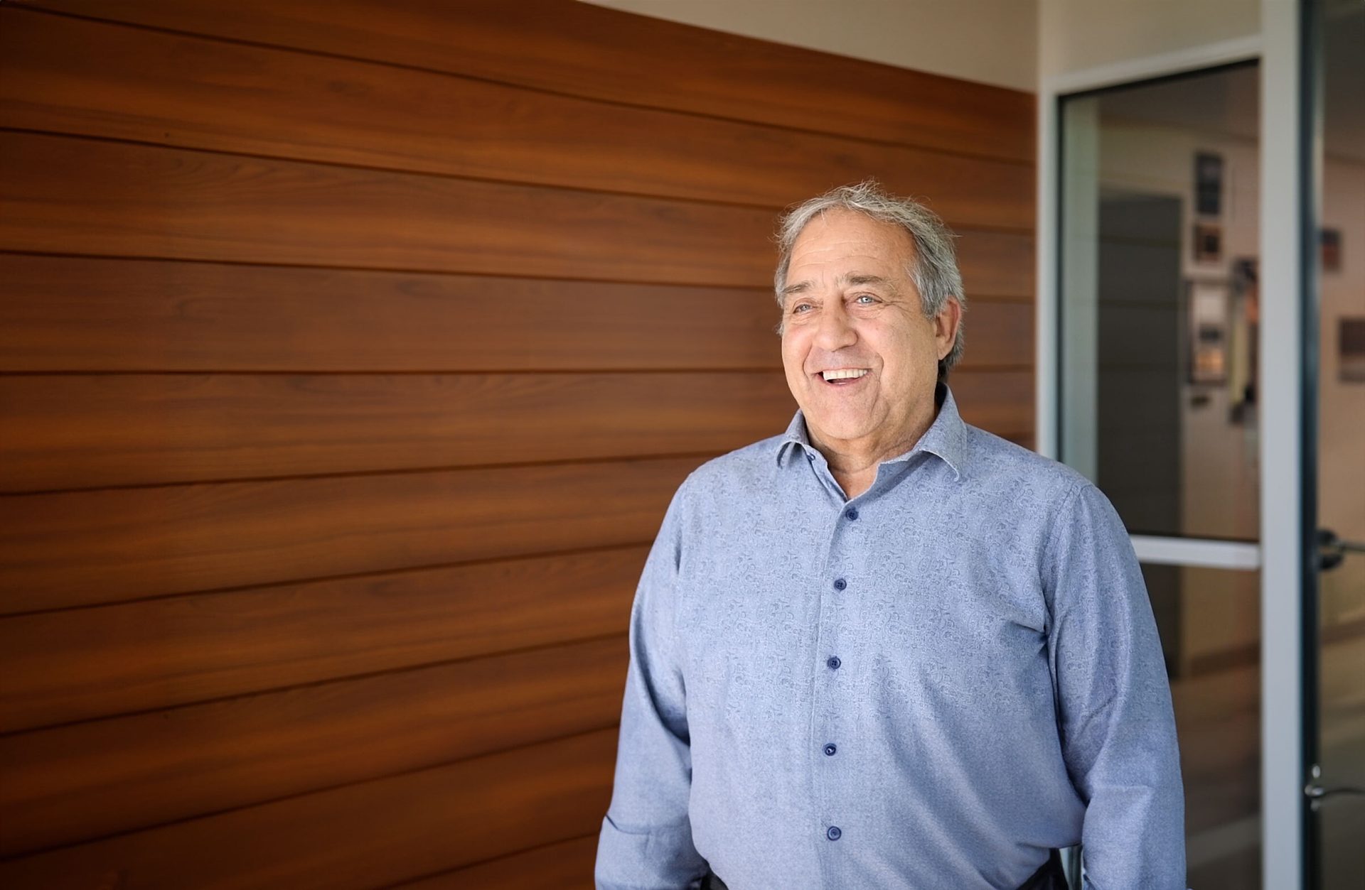 Dress shirt, Flash photography, Sleeve, Wood, Door, Smile, Collar