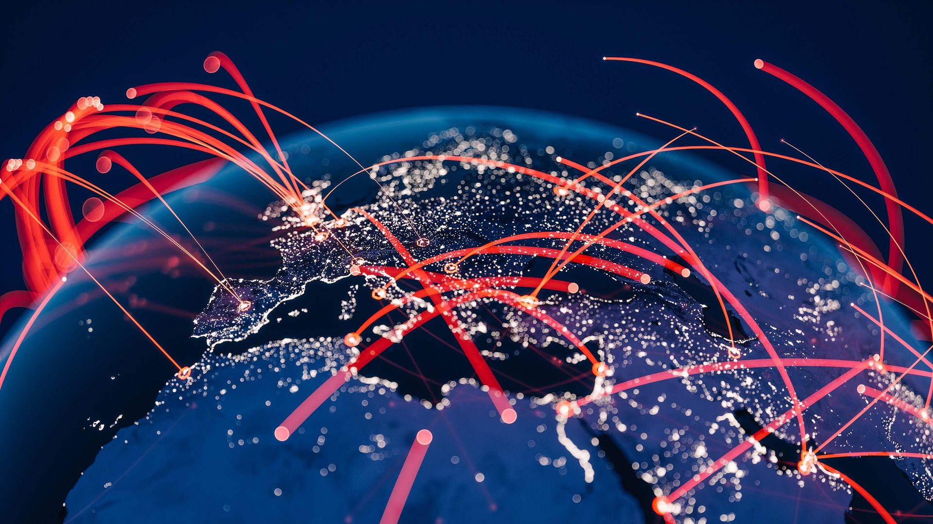 Global network: red lines connect glowing cities on Earth at night.