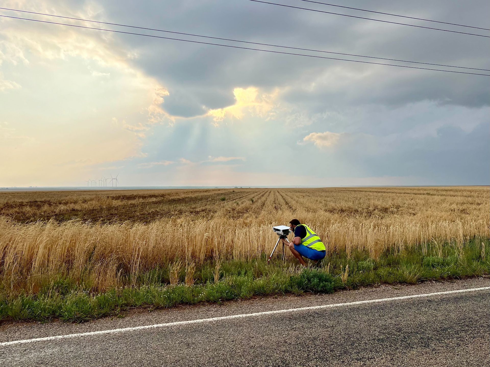 People in nature, Land lot, Natural landscape, Cloud, Sky, Plant, Asphalt, Grass
