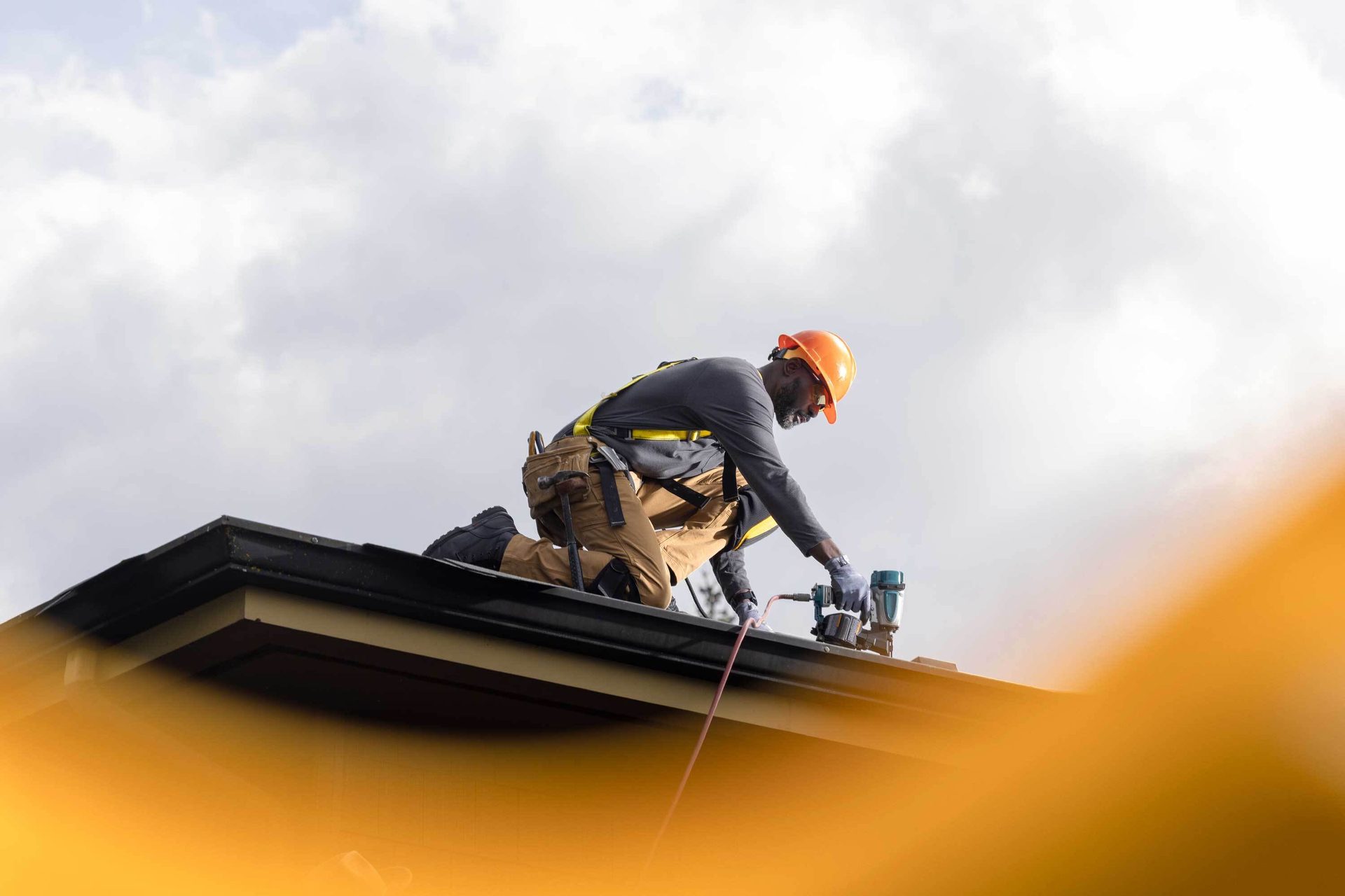 Hard hat, Sky, Cloud, Helmet, Roofer, Workwear, Tradesman