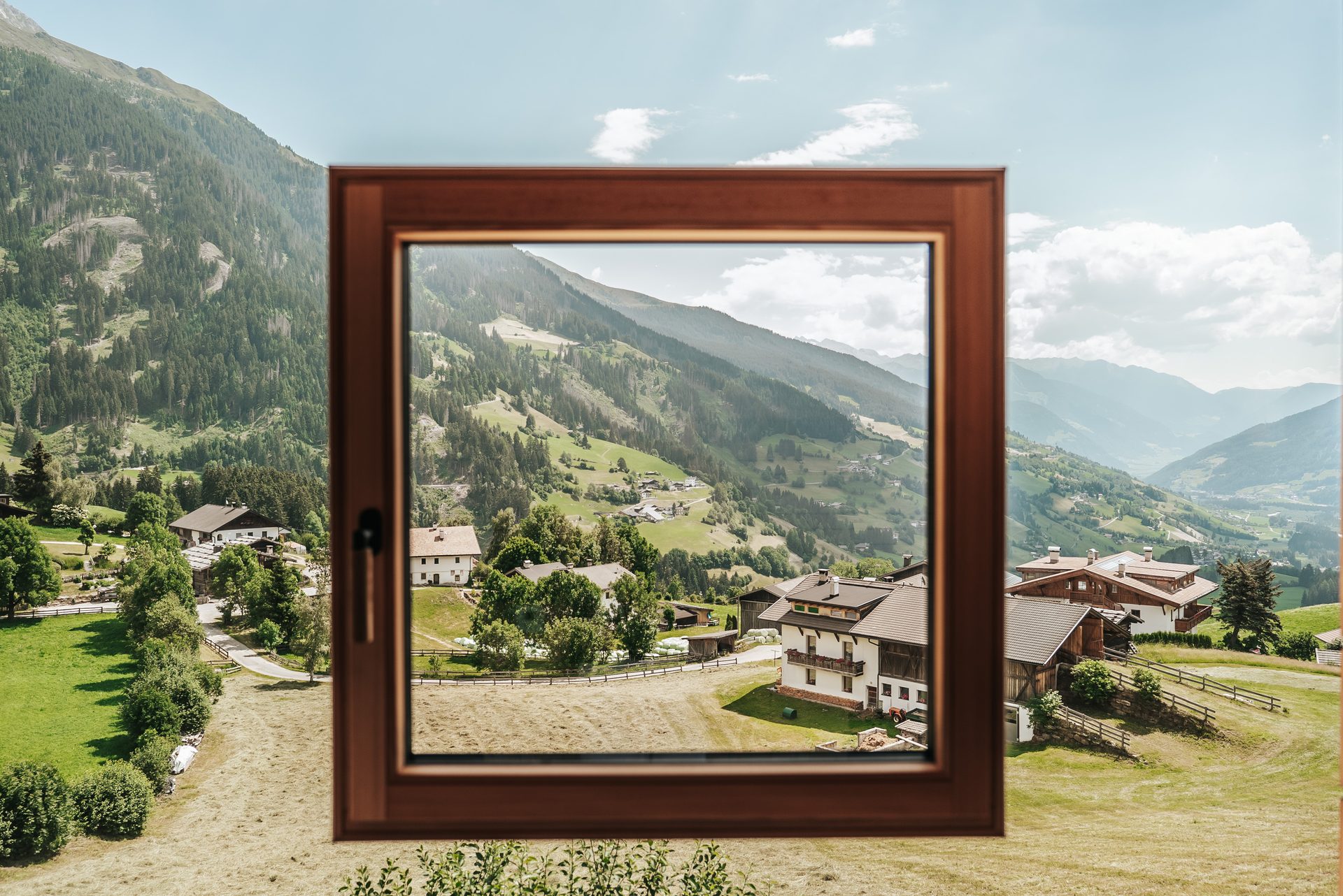 A picturesque alpine village nestled in a green mountain valley, framed by a rustic wooden window on a sunny day.