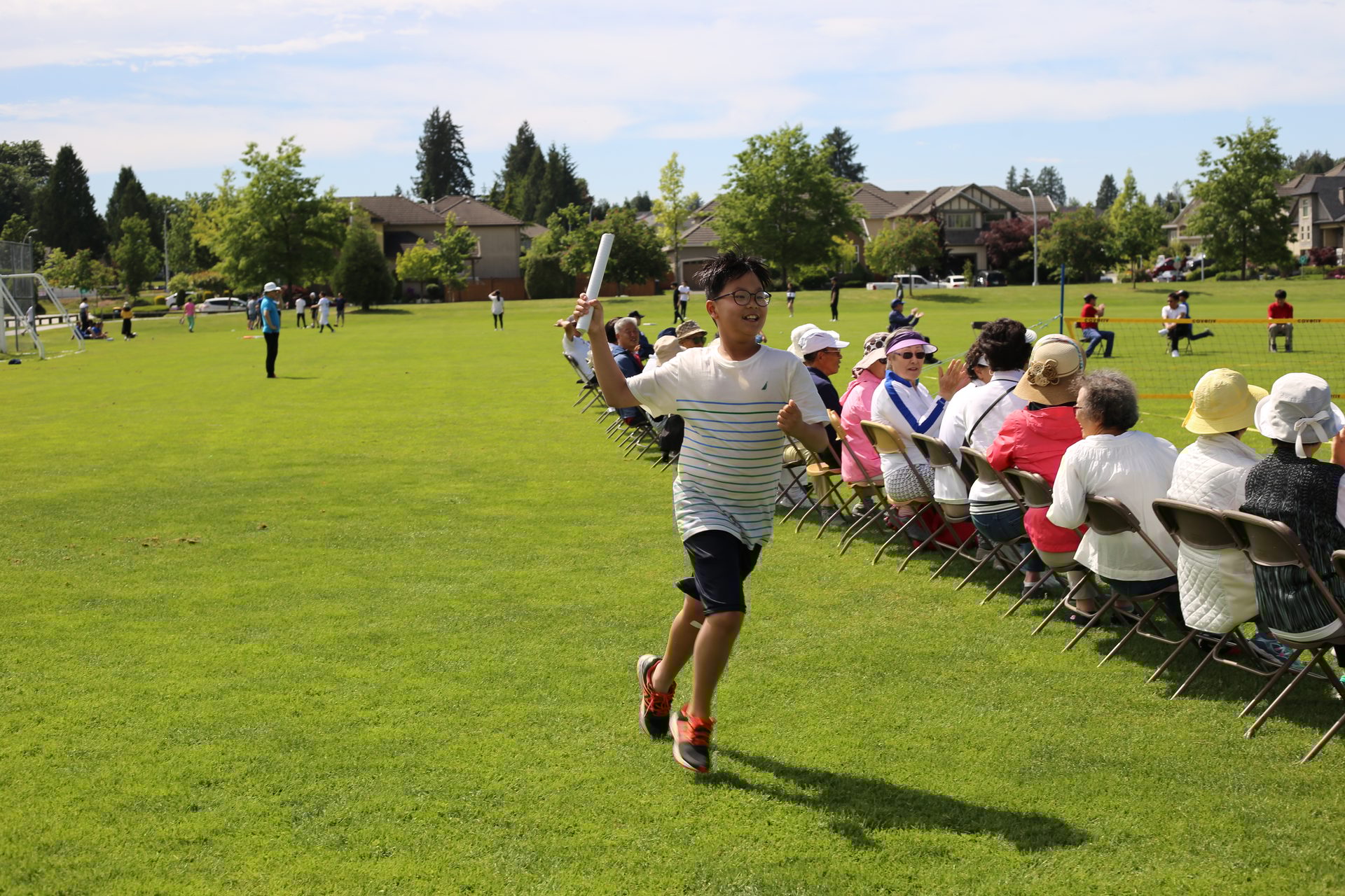 Playing sports, Cloud, Sky, Shorts, Plant, Tree, Player, Grass