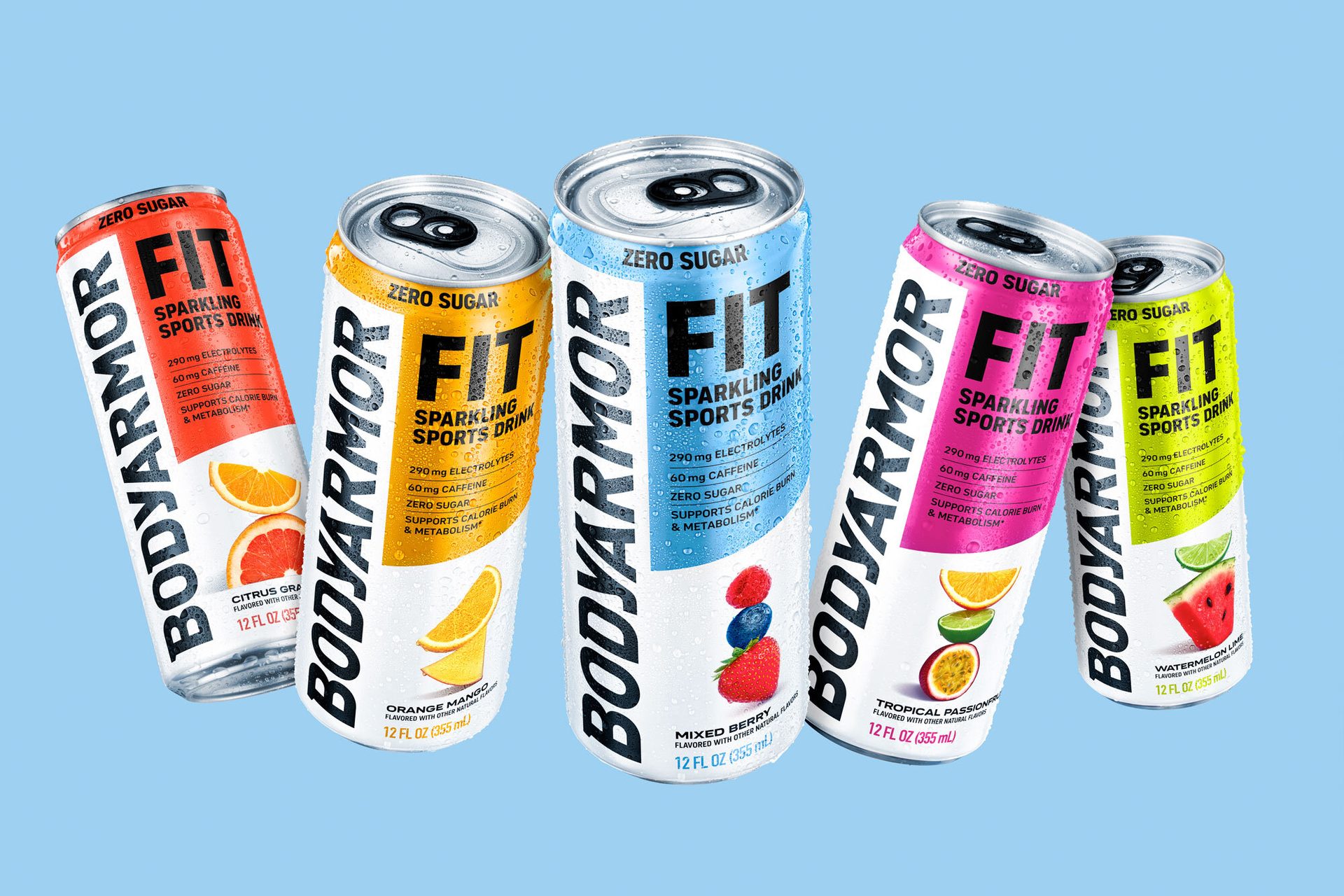 Five colorful Bodyarmor Fit Sparkling Sports Drink cans with various fruit illustrations on blue background.