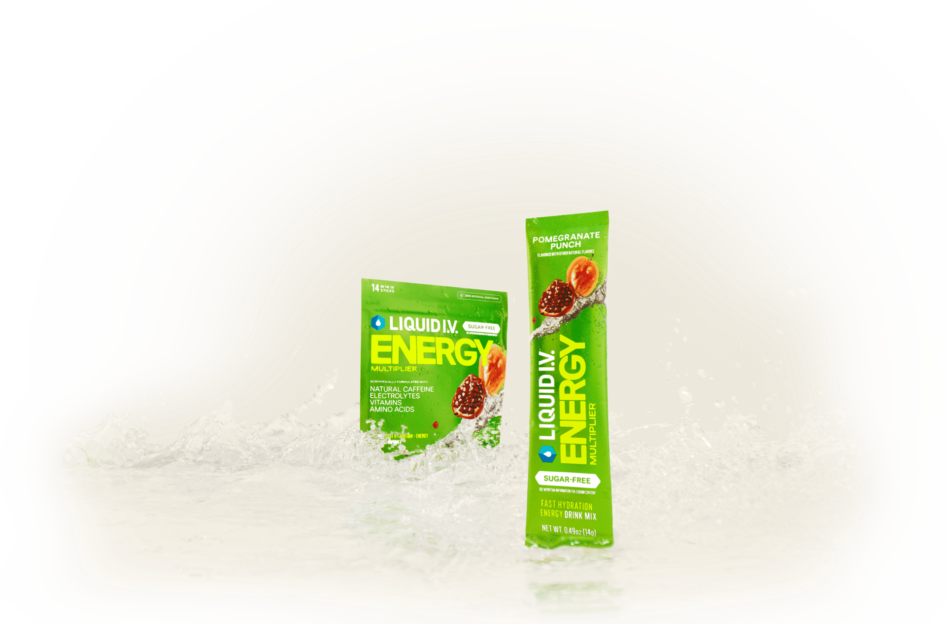 Liquid IV Energy Multiplier Pomegranate Punch (pouch and stick) in water splashes.