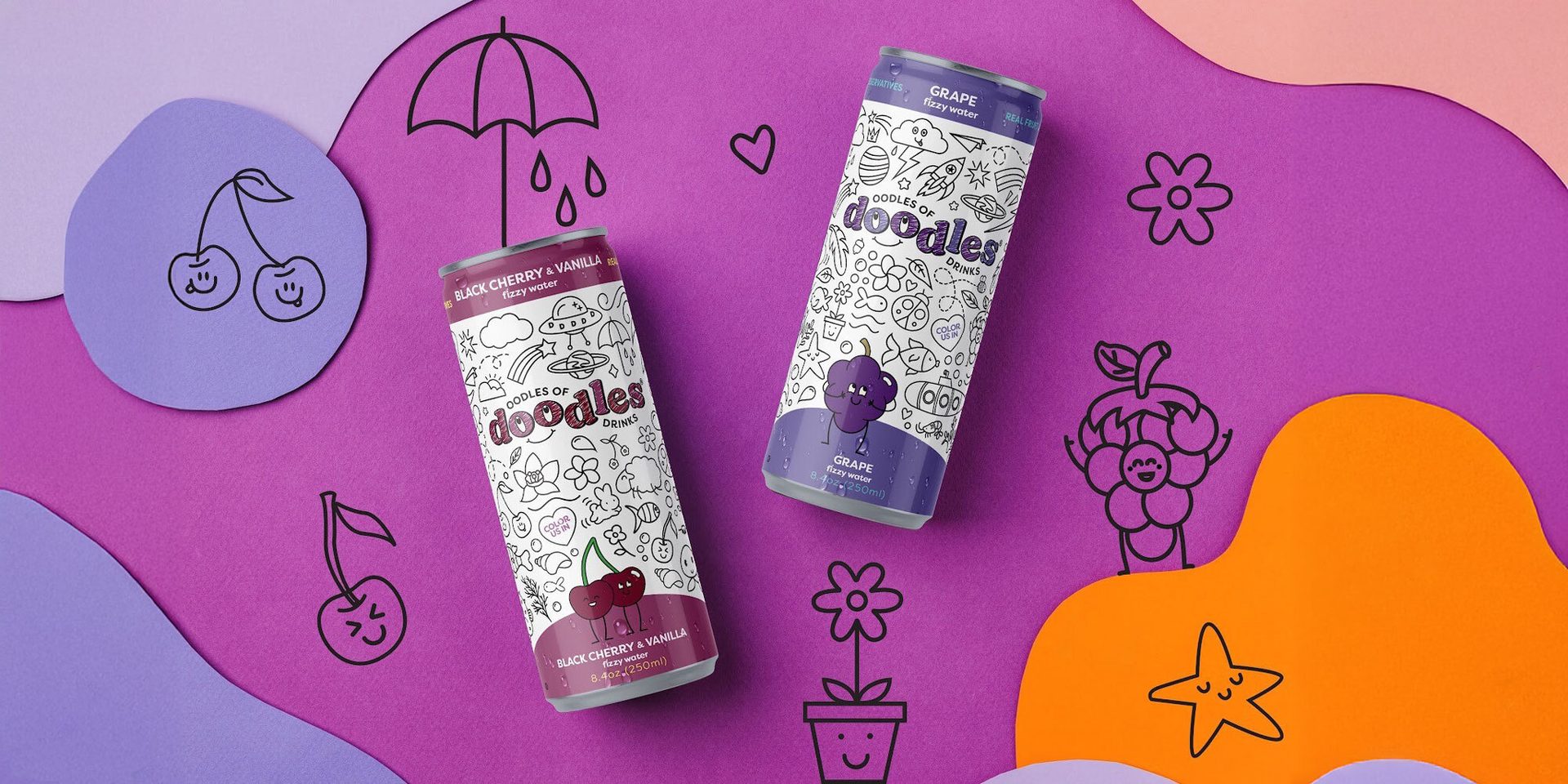 Two "Doodles of Drinks" fizzy water cans (cherry, grape) on a colorful paper cutout background.