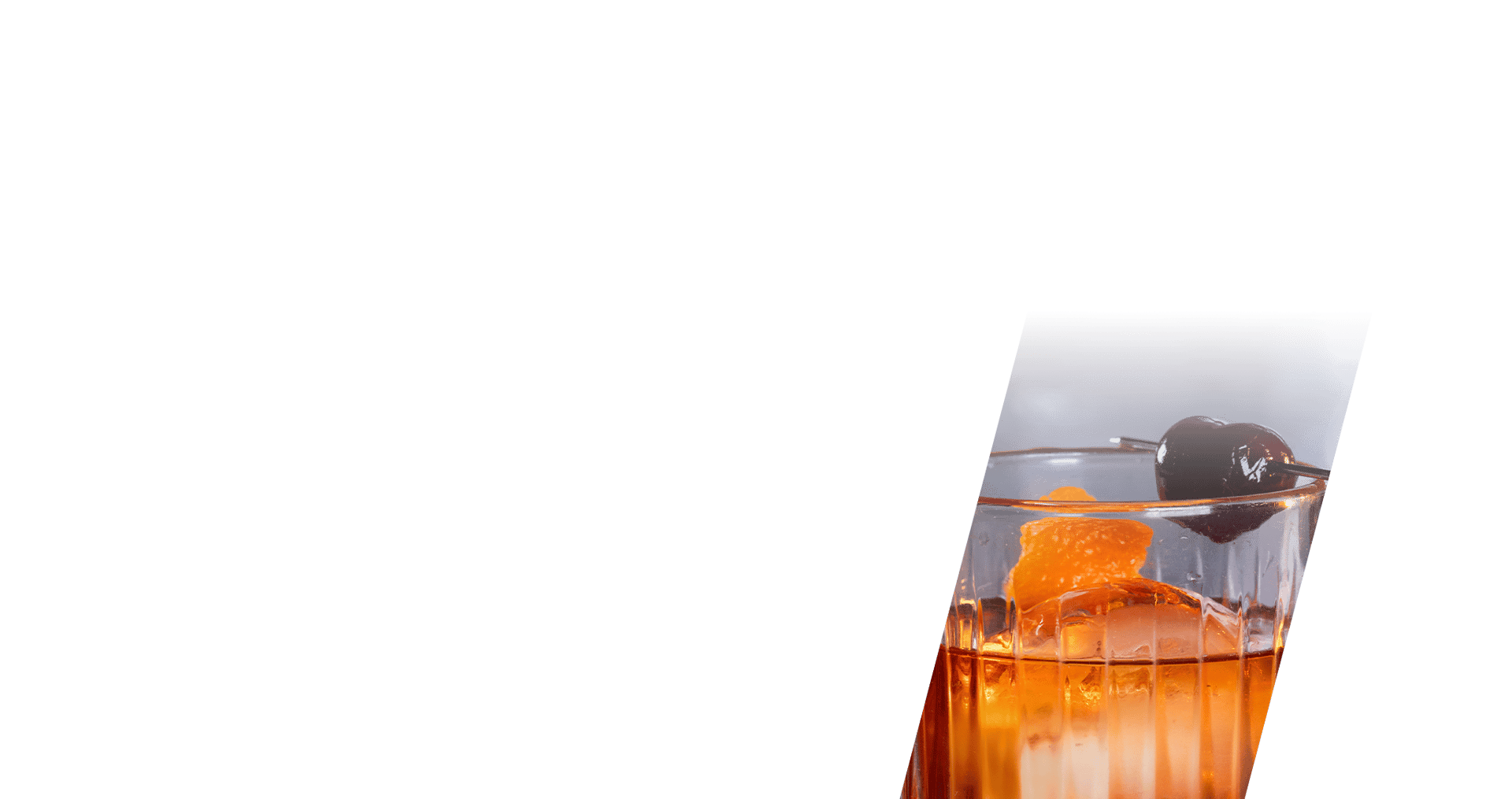 A vibrant orange cocktail in a rocks glass, garnished with an orange peel and a dark cherry on a skewer.