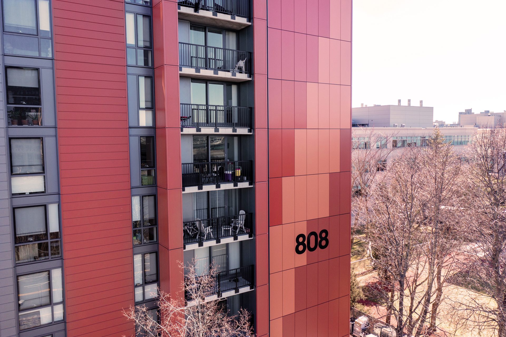 Urban design, Tower block, Building, Daytime, Window, Condominium, Tree, Line, Red