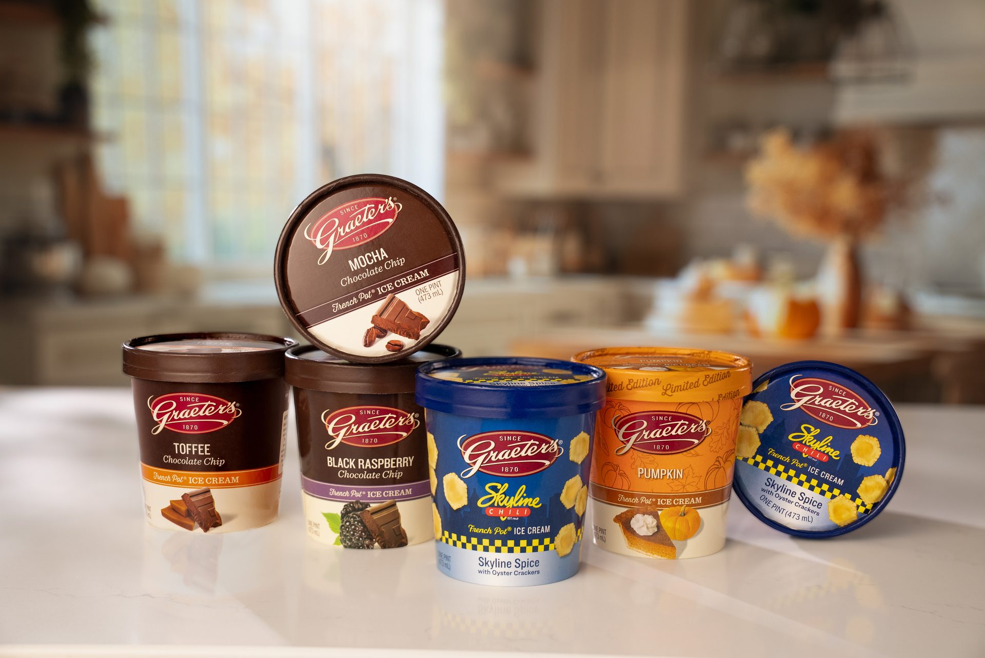 Graeter's ice cream pints: Mocha, Toffee, Black Raspberry, Pumpkin, and Skyline Spice w/ crackers.