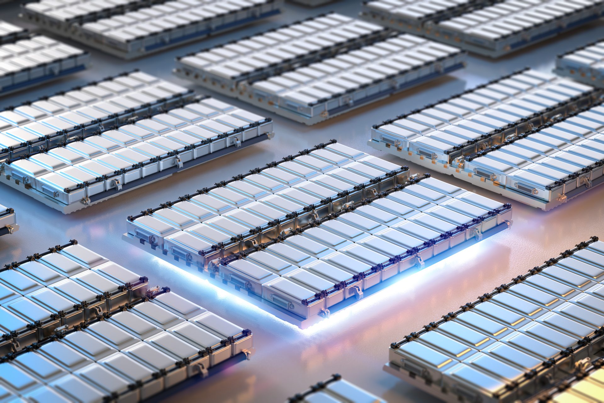 A grid of modern battery modules, with a central unit emitting a blue glow, signifying advanced energy storage technology.