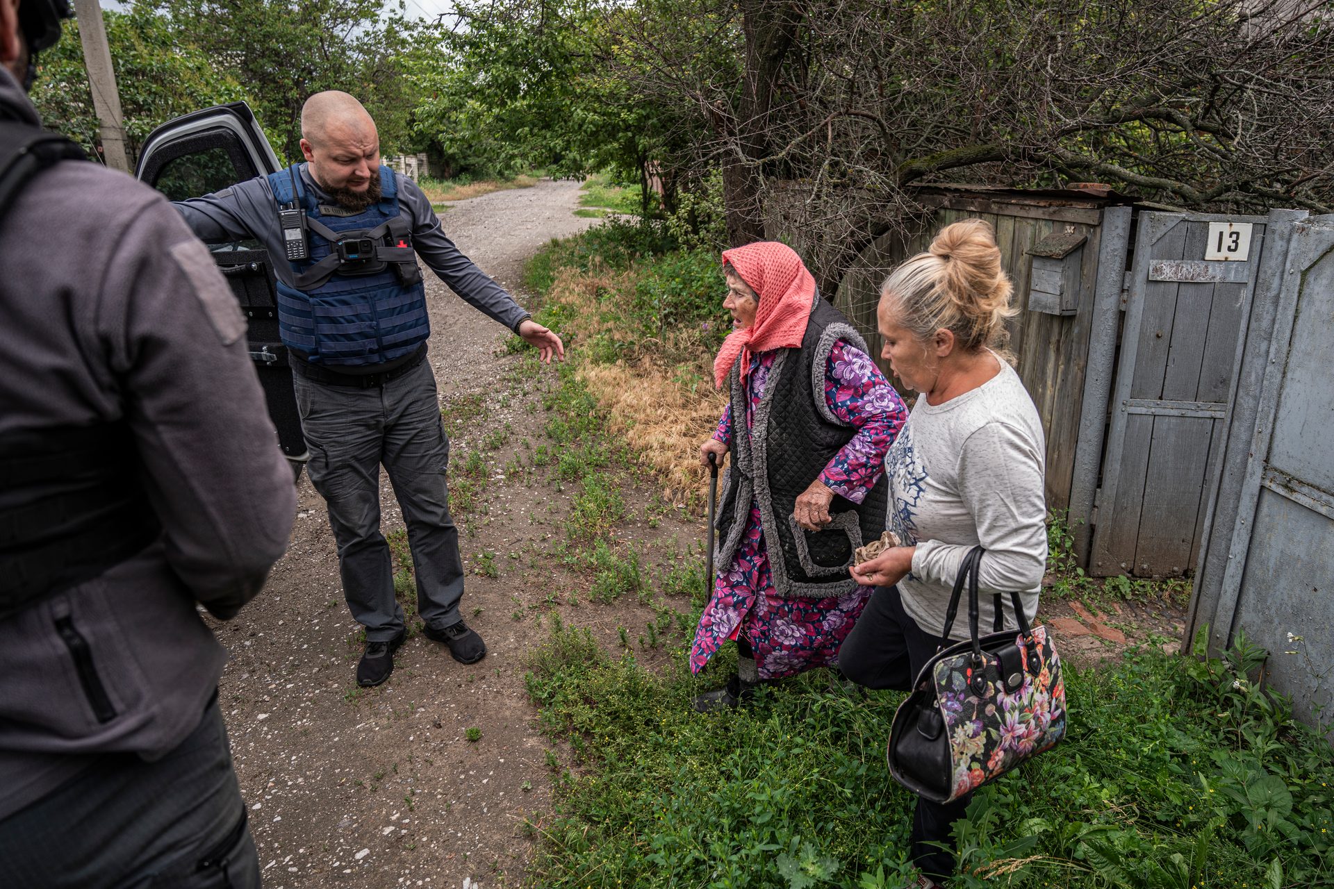 Two women evacuated in Kupiansk, Kharkiv region. July 3, 2025.07. Photo credit: Seth Scott, RCC