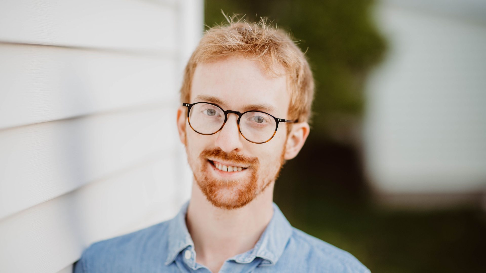 Vision care, Human body, Flash photography, Glasses, Forehead, Nose, Smile, Beard, Ear, Jaw