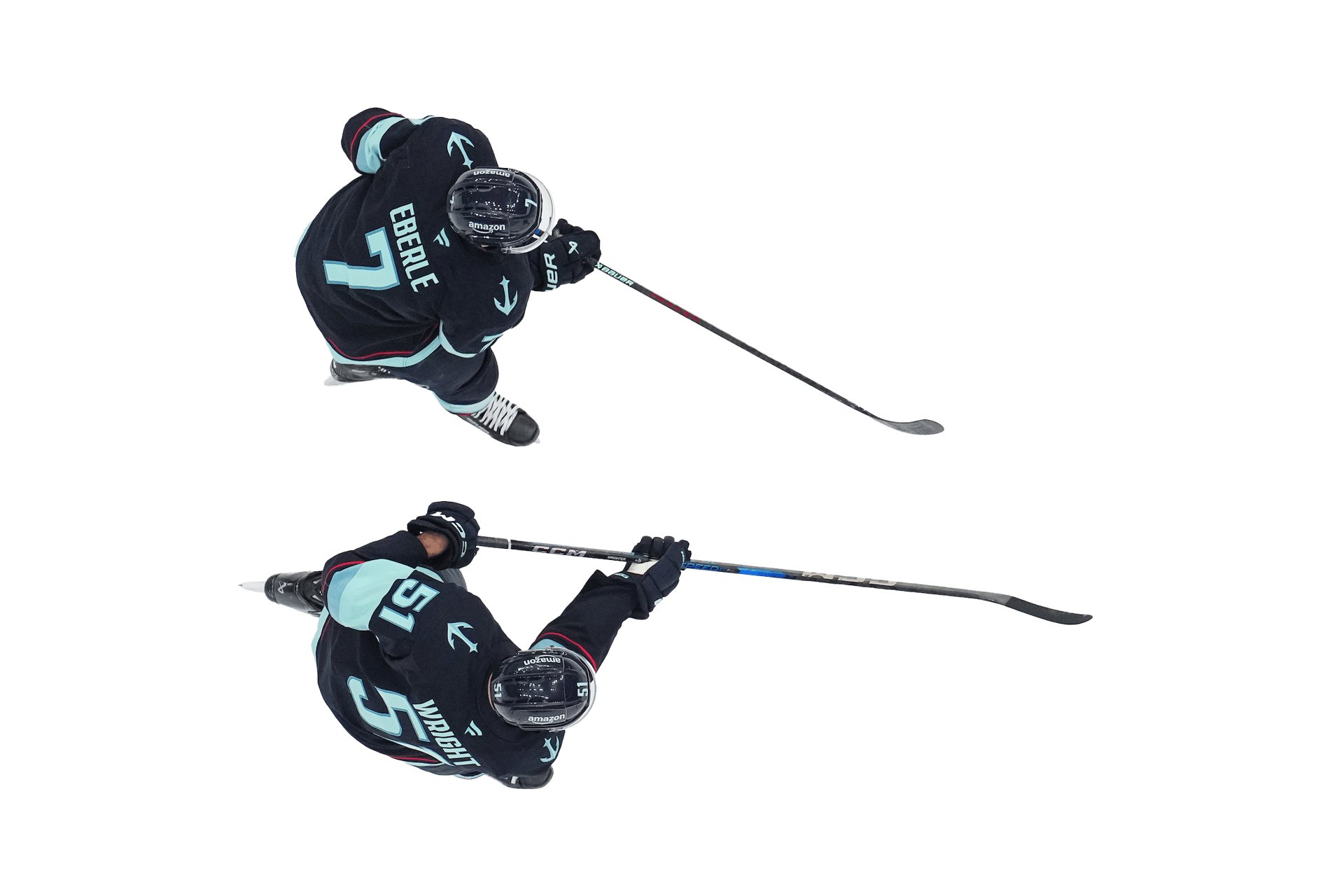 Two hockey players, viewed from above, in dark teal jerseys, holding hockey sticks.