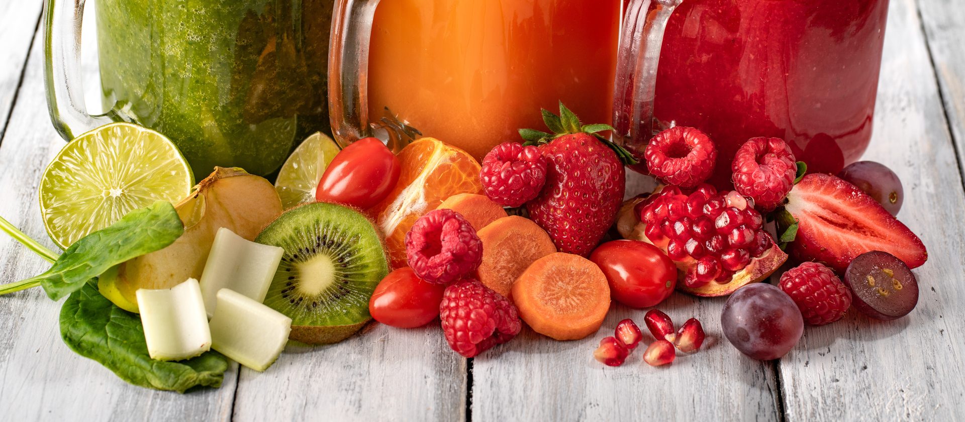 Colorful fresh juices with fruits and vegetables.