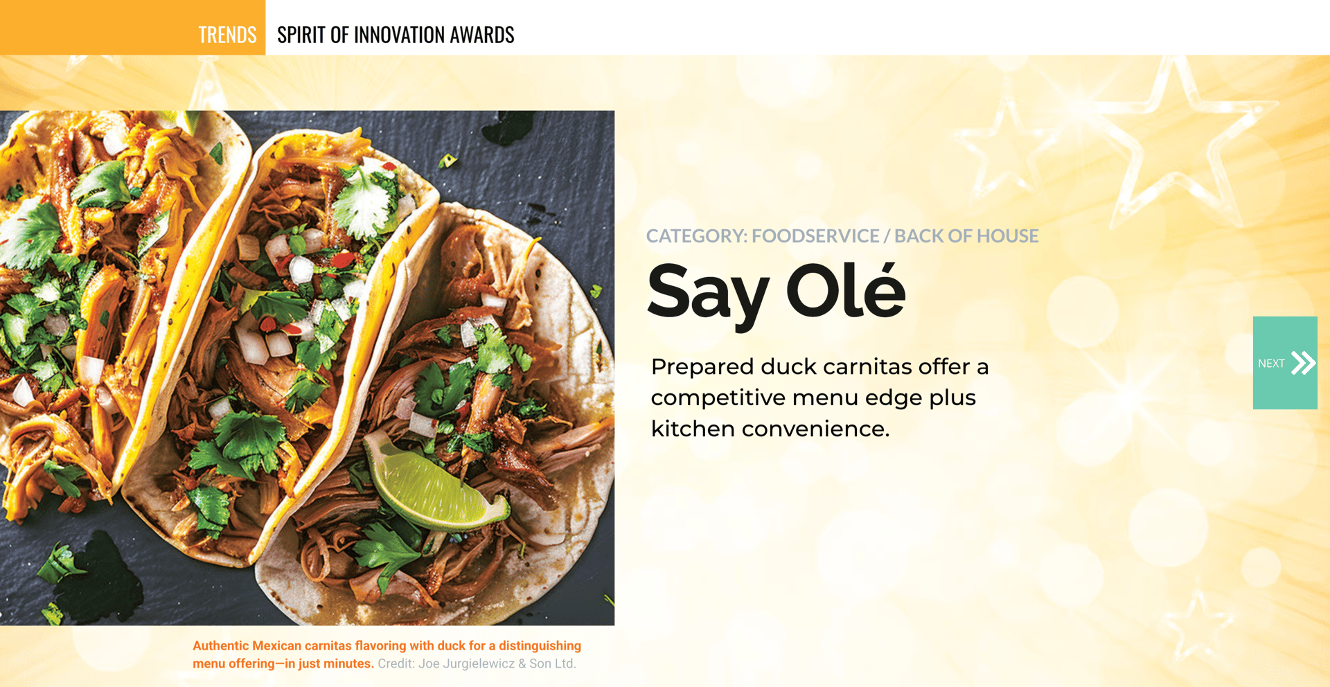 Three duck carnitas tacos, topped with cilantro, onion, and a lime wedge.