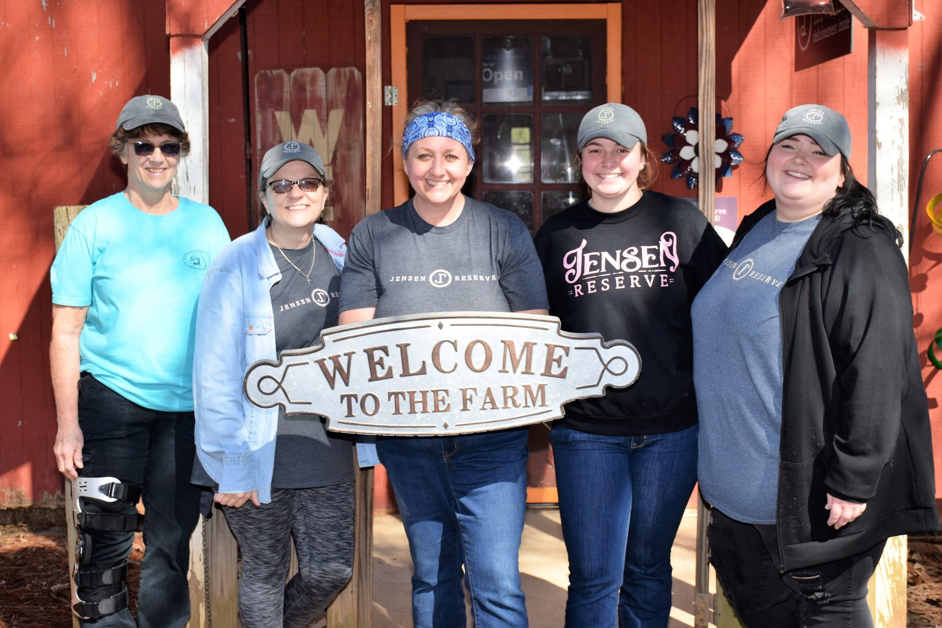 Facial expression, Social group, Smile, Jeans, Human, Sleeve, Sunglasses, Fun