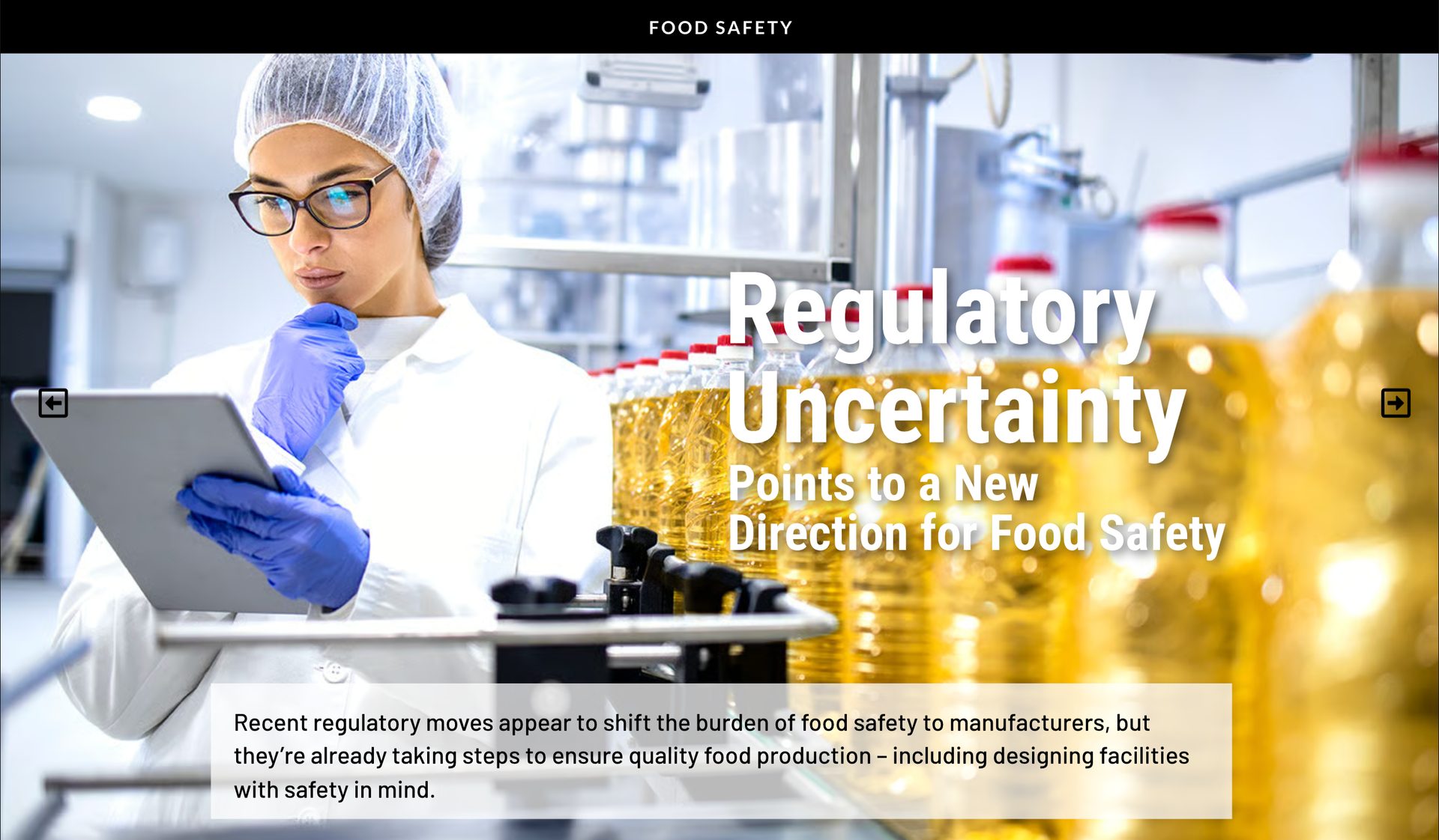 Food safety scientist reviewing data on tablet in a food plant.