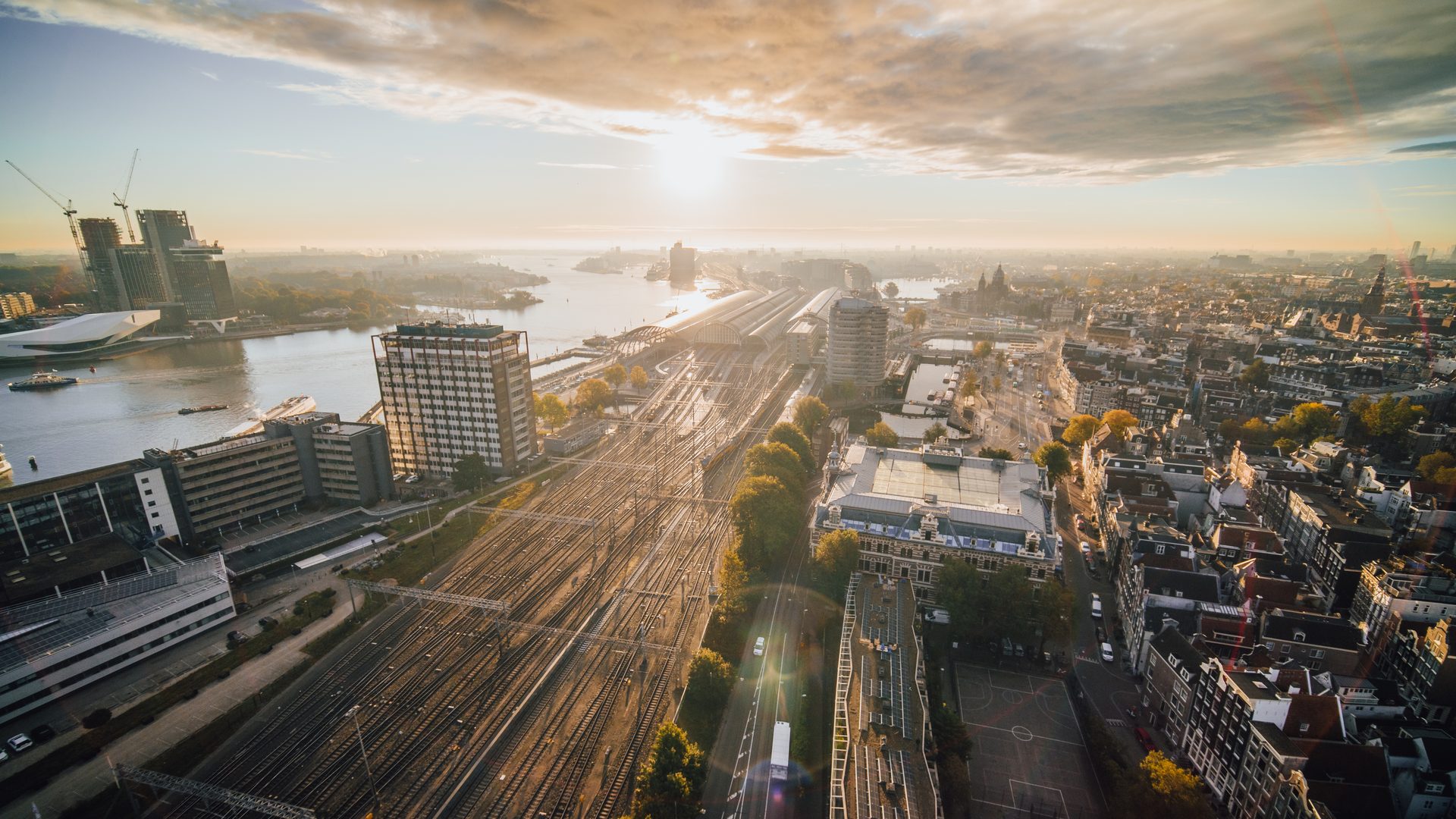 Tower block, Cloud, Sky, Daytime, Water, Building, Light, Dusk, Sunlight