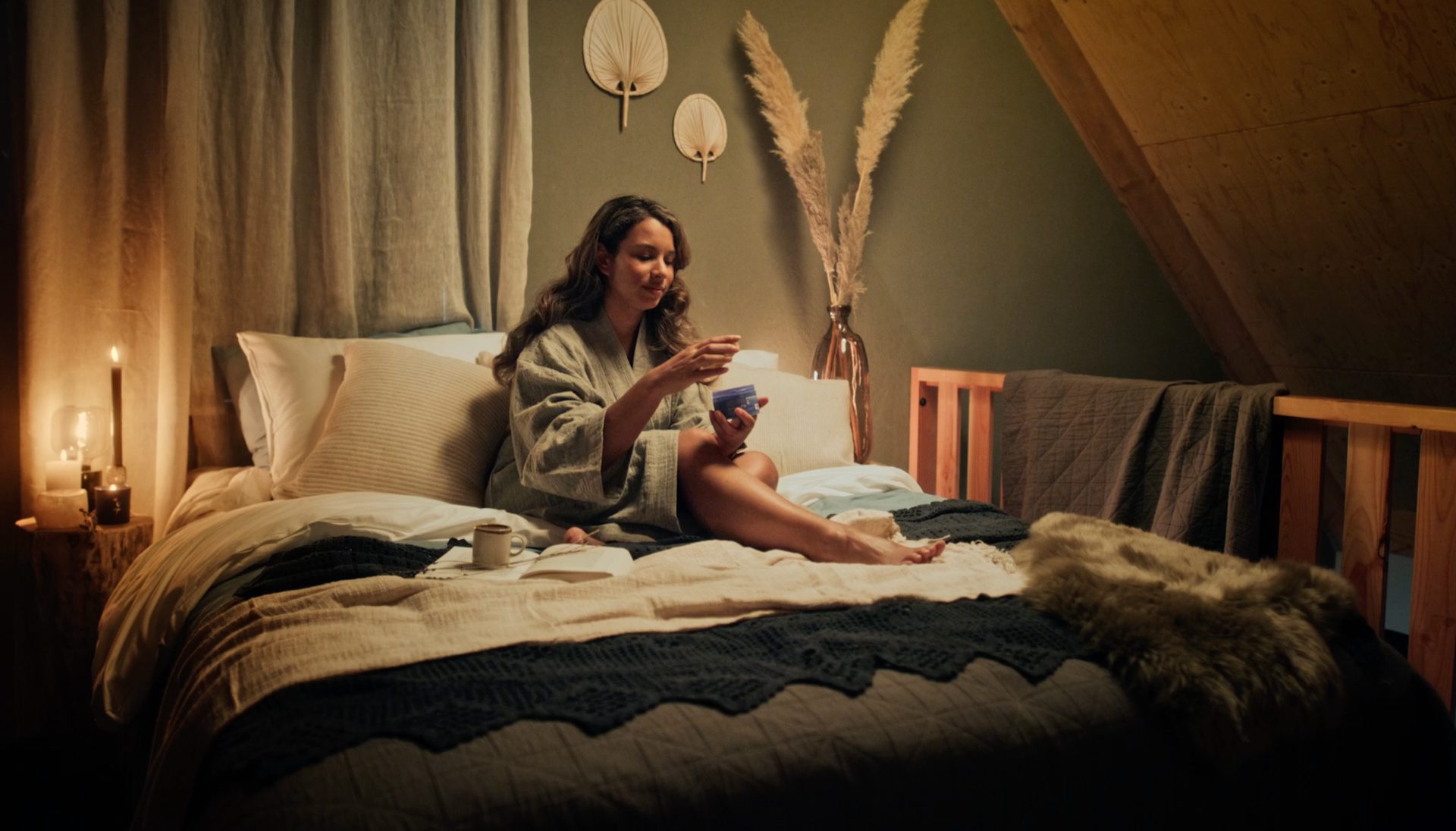 Interior design, Bed frame, Comfort, Human, Wood, Textile, Lighting, Lamp, Floor, Flooring