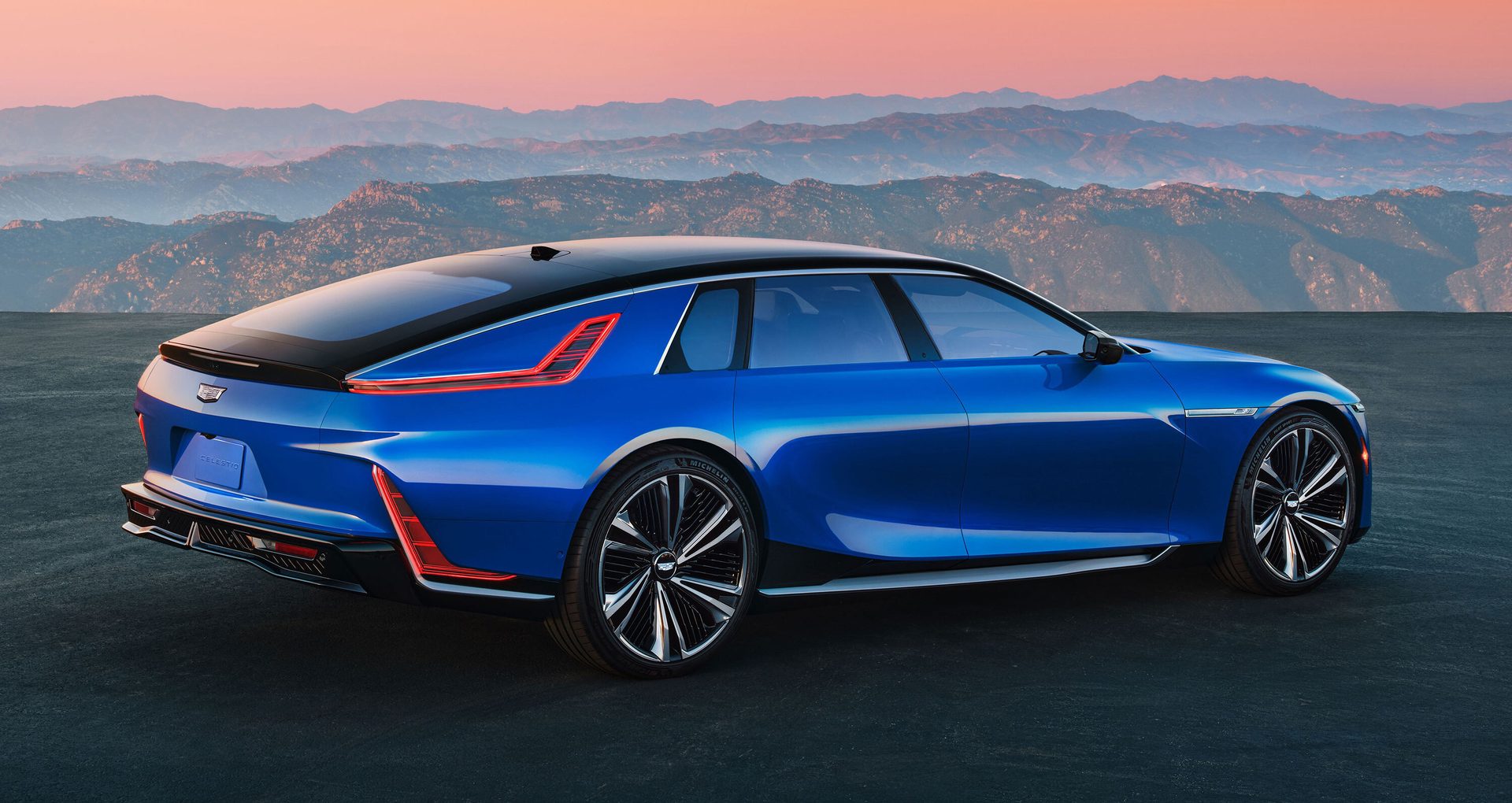 Automotive lighting, Wheel, Tire, Sky, Vehicle, Car, Window, Hood, Blue