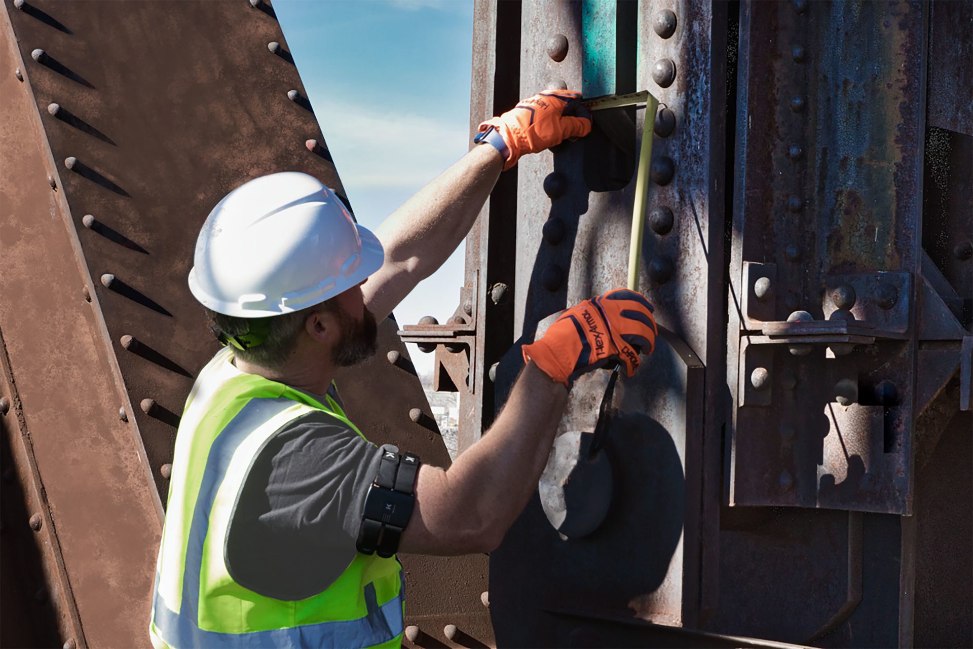 Hard hat, Construction worker, Helmet, Workwear, Tradesman, Engineer, Headgear, Sky