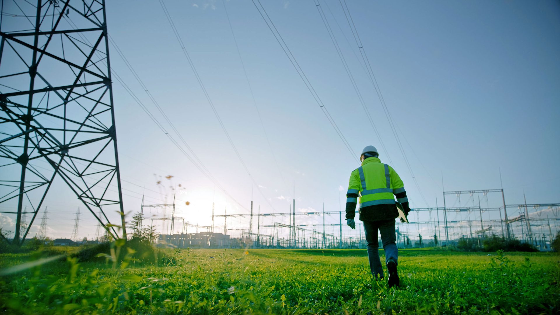 People in nature, Overhead power line, High-visibility clothing, Sky, Plant, Infrastructure, Asphalt, Electricity, Happy, Grass