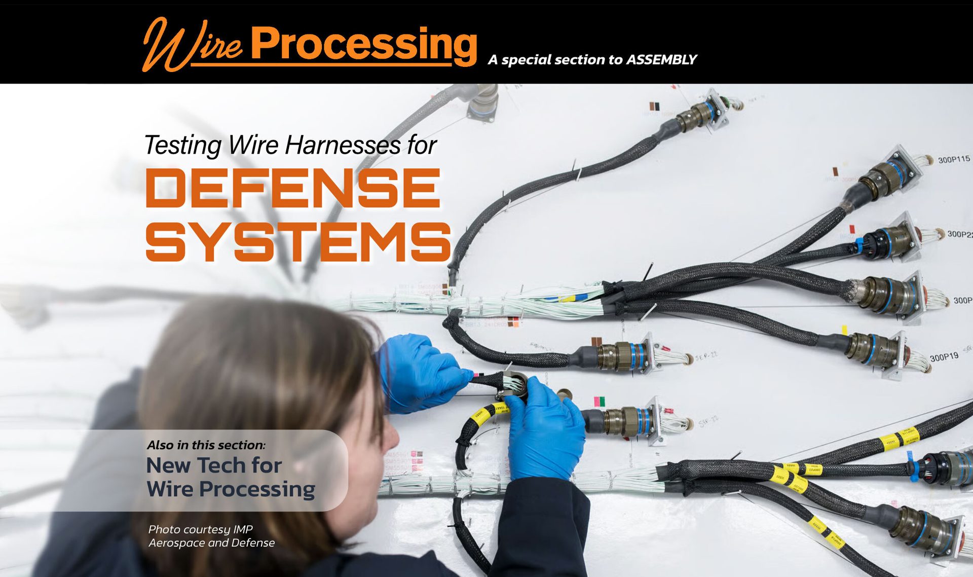 Person in blue gloves tests complex wire harnesses for defense systems.