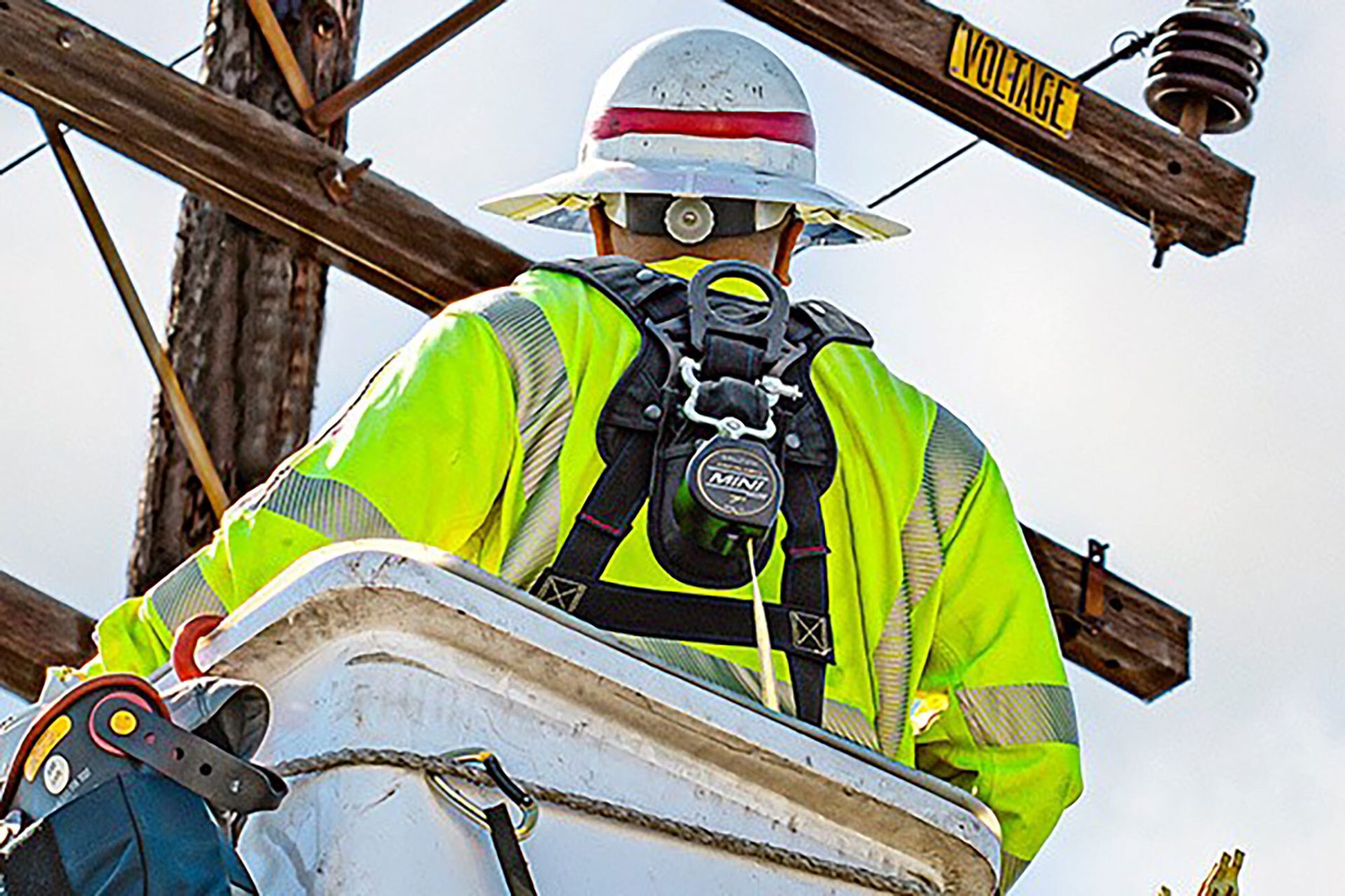 Hard hat, High-visibility clothing, Construction worker, Workwear, Helmet, Green, Chainsaw, Yellow