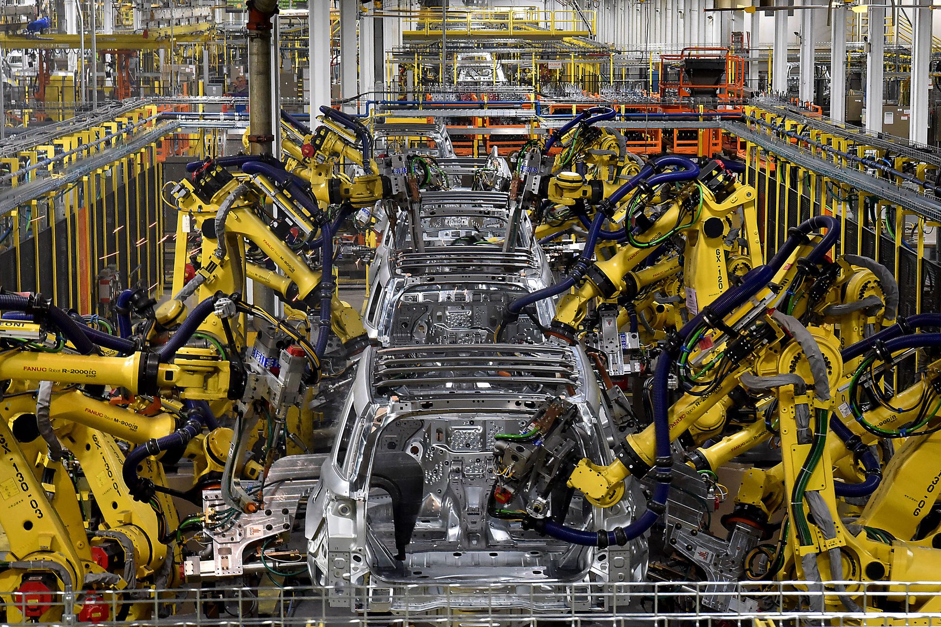 Motor vehicle, Automotive tire, Mass production, Urban design, Yellow, Industry