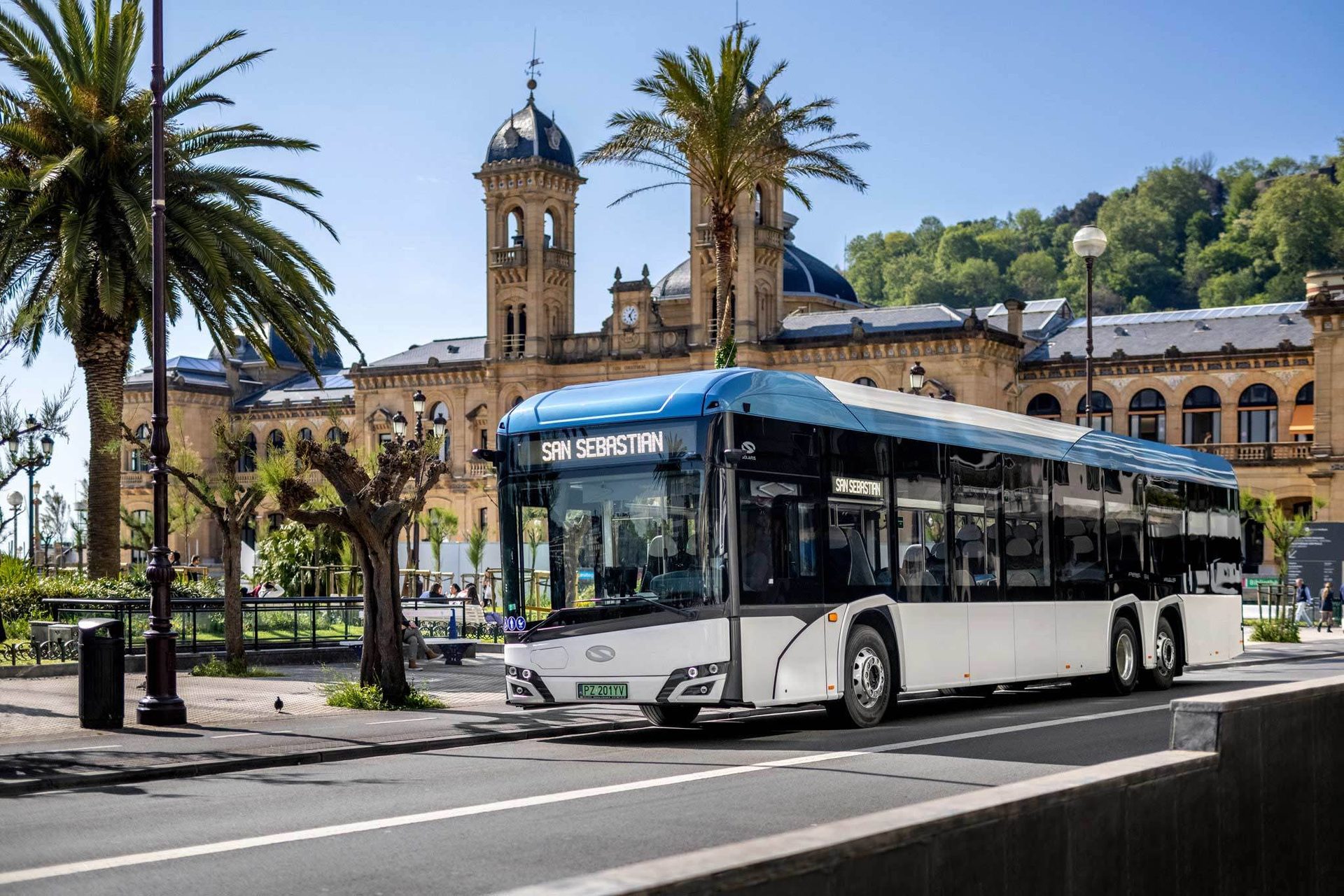 Mode of transport, Motor vehicle, Sky, Bus, Building, Wheel, Plant, Tree, Tire