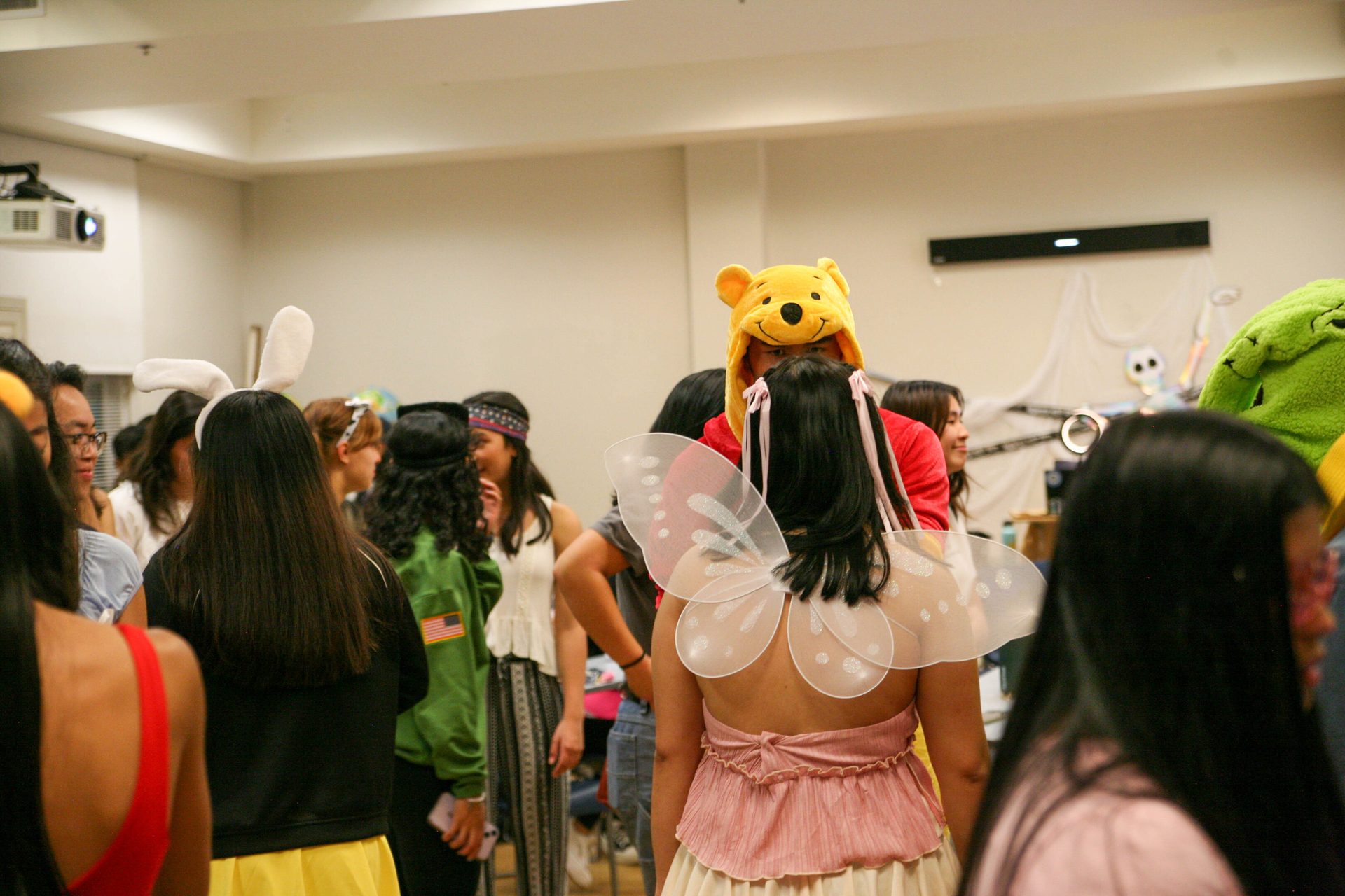 Social group, Fashion, Yellow, Headgear, Fun
