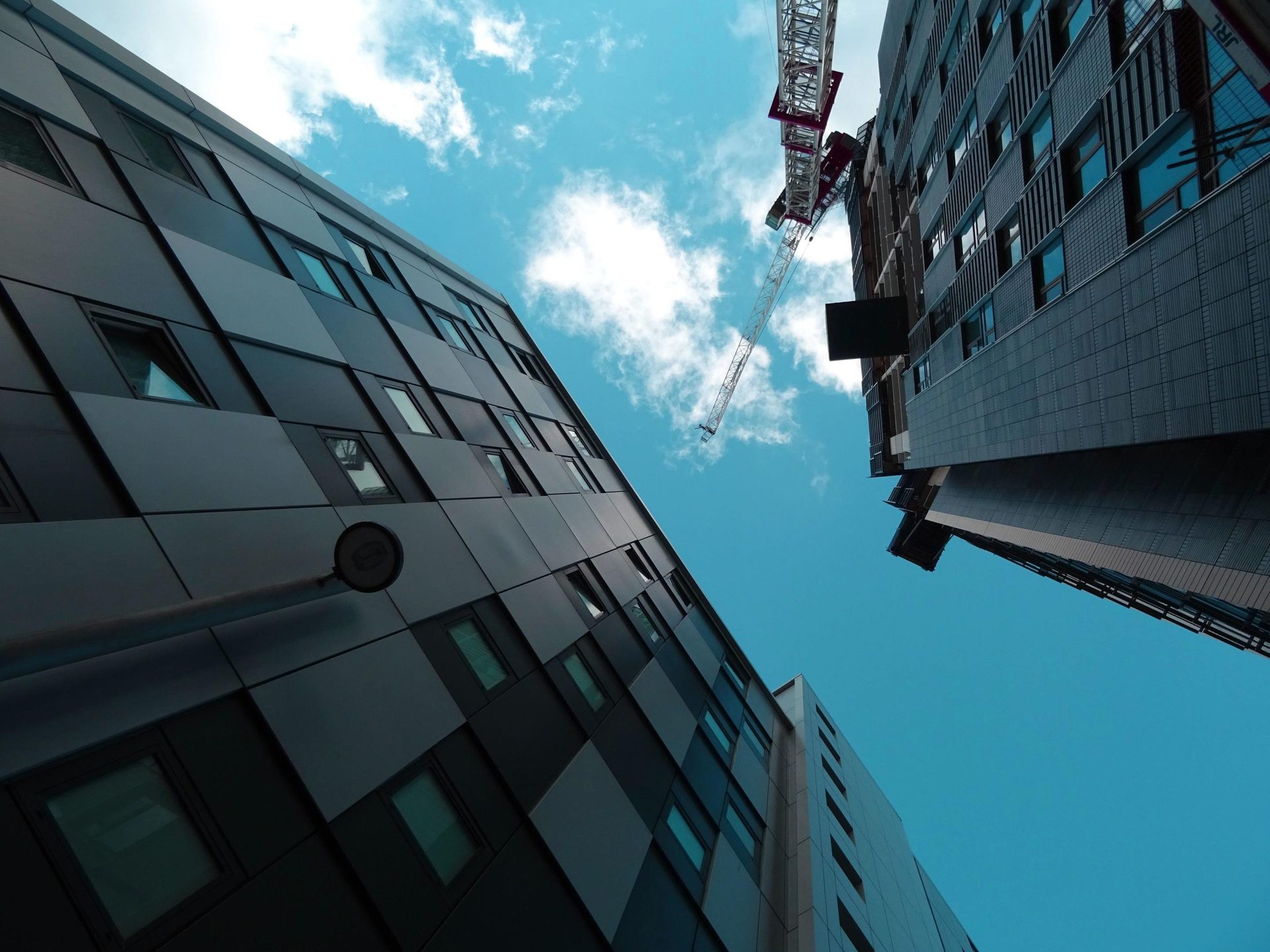 Urban design, Tower block, Material property, Cloud, Sky, Building, Window, Azure, Line, Rectangle