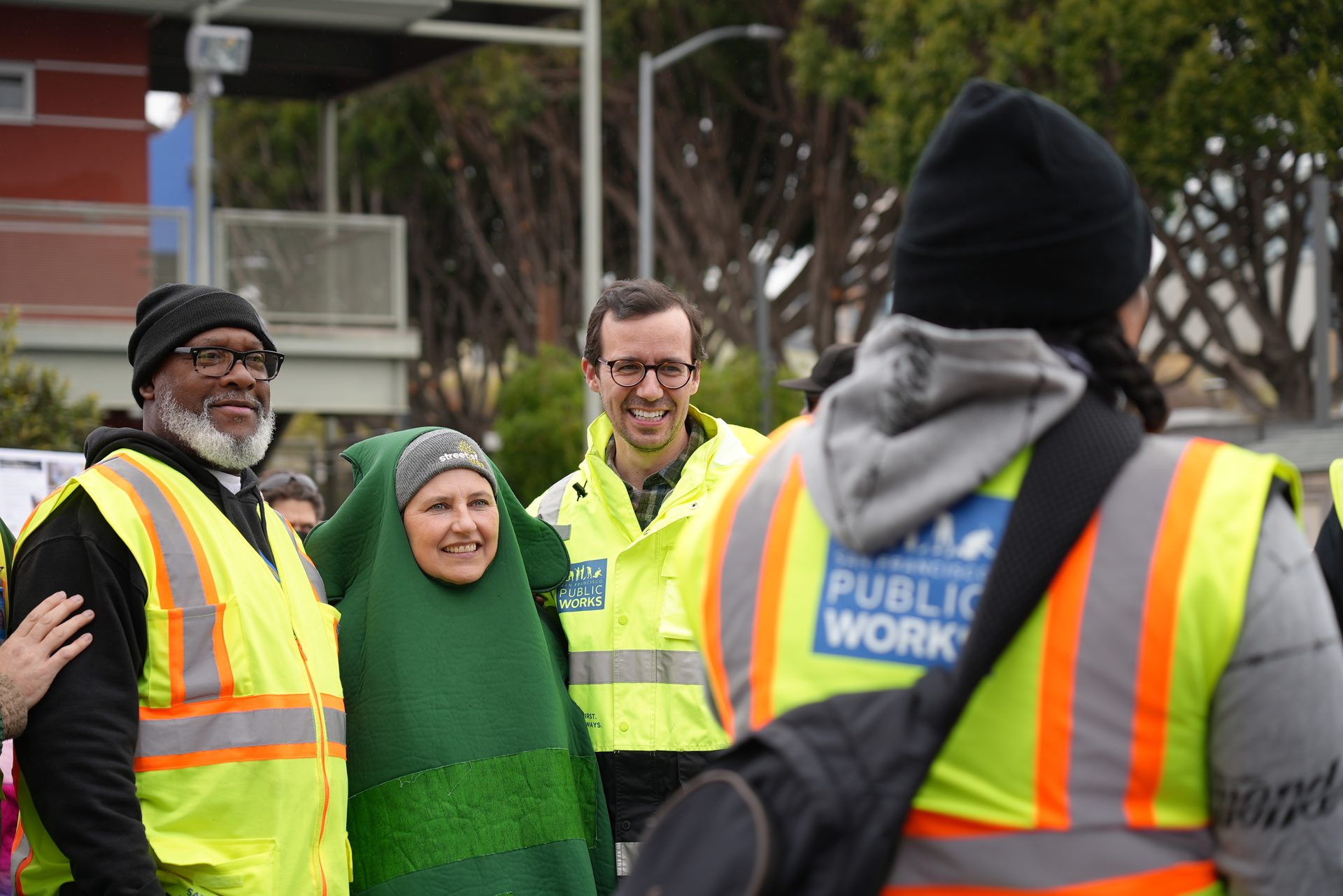 High-visibility clothing, Motor vehicle, Outerwear, Smile, Workwear, Jacket, Headgear