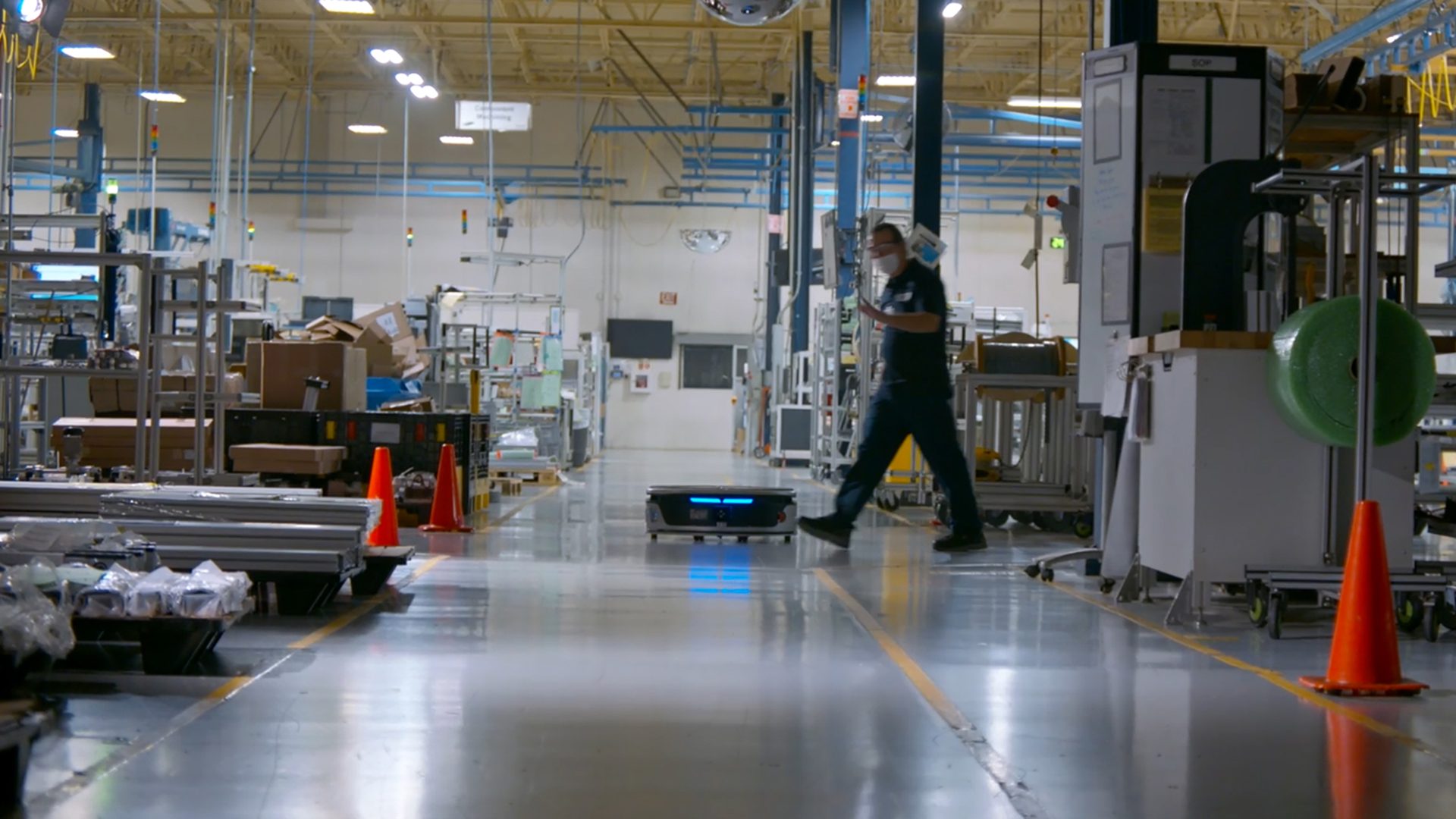 An Autonomous Mobile Robot (AMR) being employed in a factory.