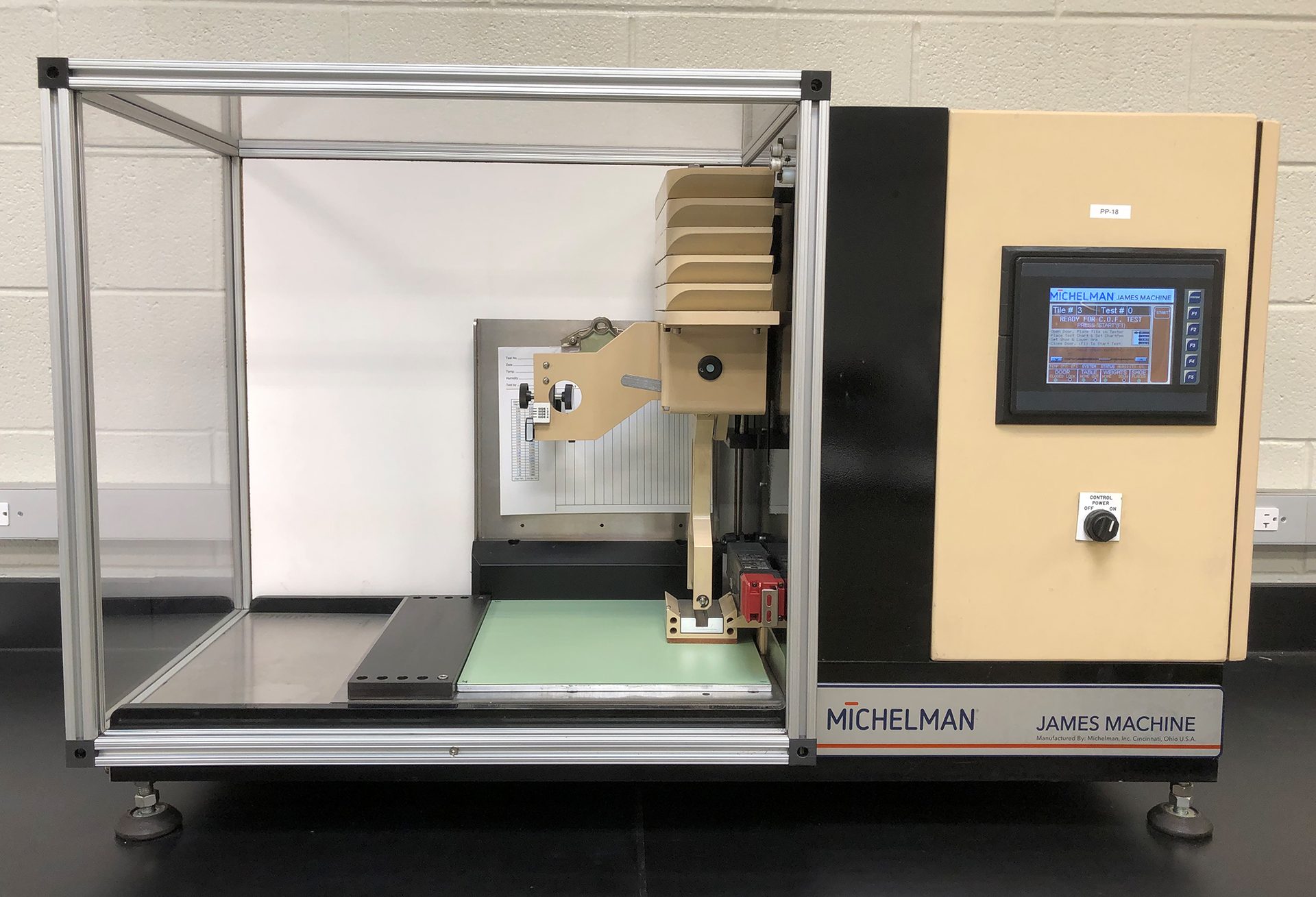 James machine (ASTM D2047 static coefficient of friction test).